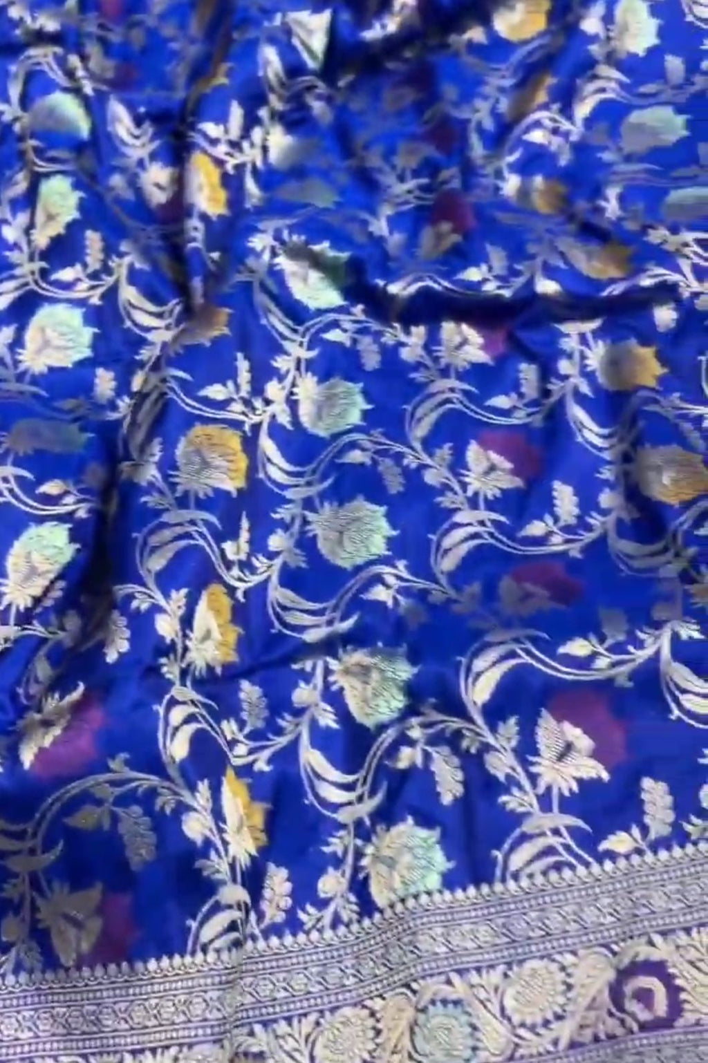 Azure Blue Handloom Banarasi Katan Silk Saree with Colorful Meenakari Floral Borders and Silk Mark Authenticity Label.