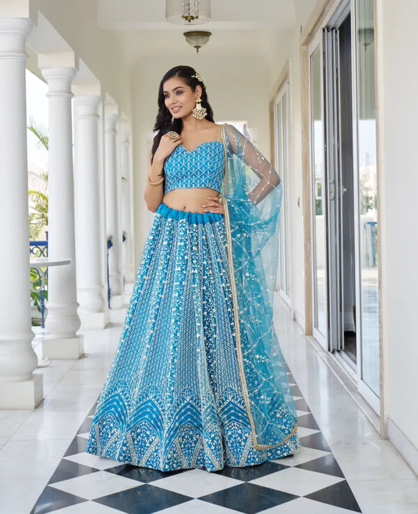 Elegant Pacific Blue Net Embroidered Lehenga Choli
