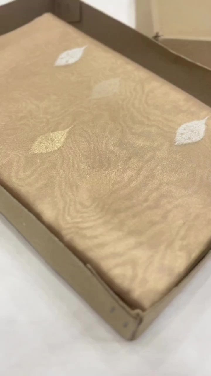 Metallic Gold Banarasi Handloom Tissue Silk Saree with Intricate Sona Rupa Gold and Silver Zari Work and Silk Mark Authenticity Tag.