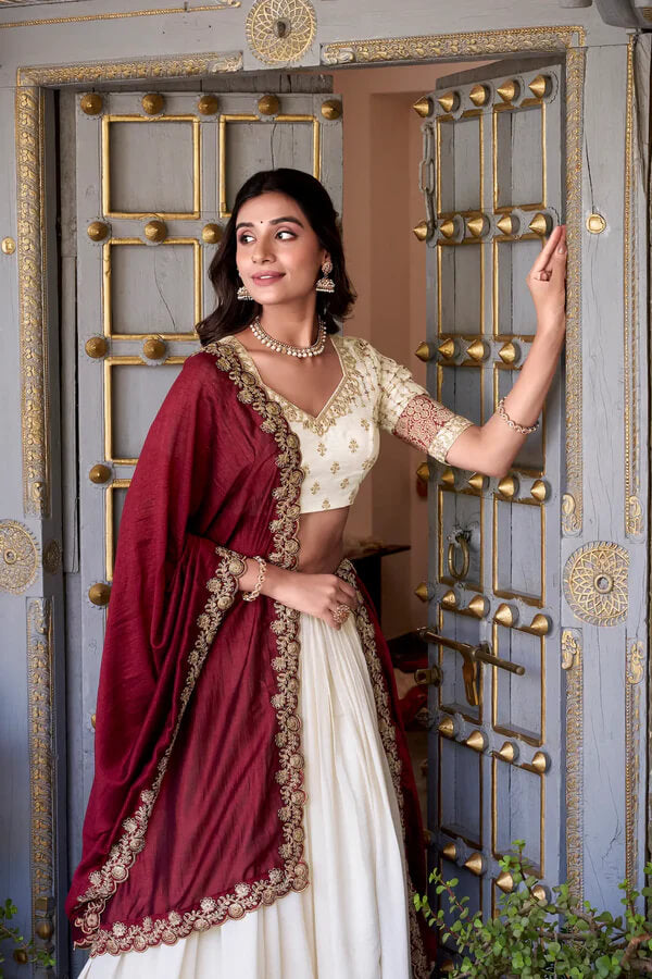 Off White Silk Lehenga with Zari Weaving and Sequins Accent
