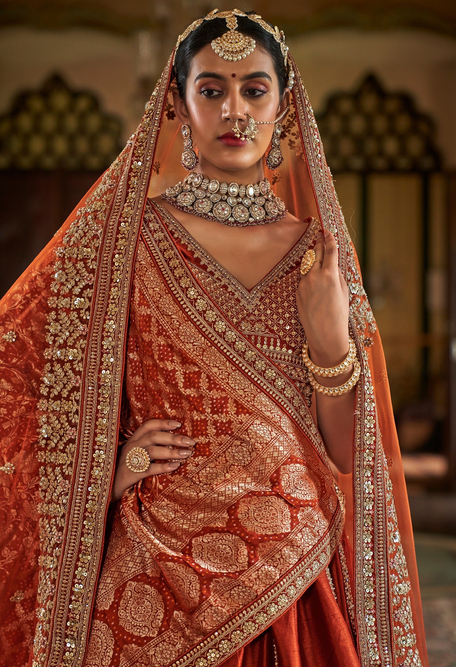 Vibrant Orange Silk Wedding Lehenga with Designer Detailing