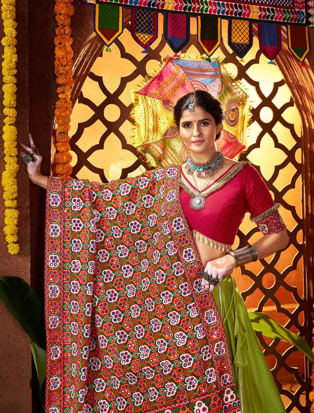 Trendy Green Embroidered Navratri Lehenga with Mirror Dupatta