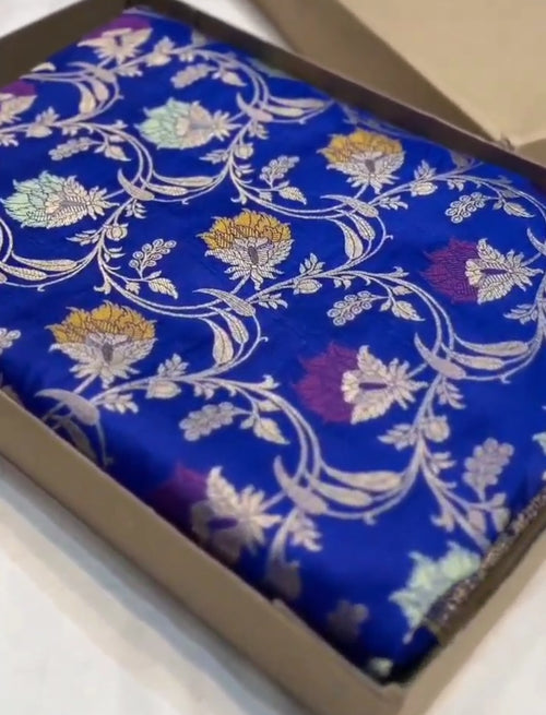 Azure Blue Handloom Banarasi Katan Silk Saree with Colorful Meenakari Floral Borders and Silk Mark Authenticity Label.