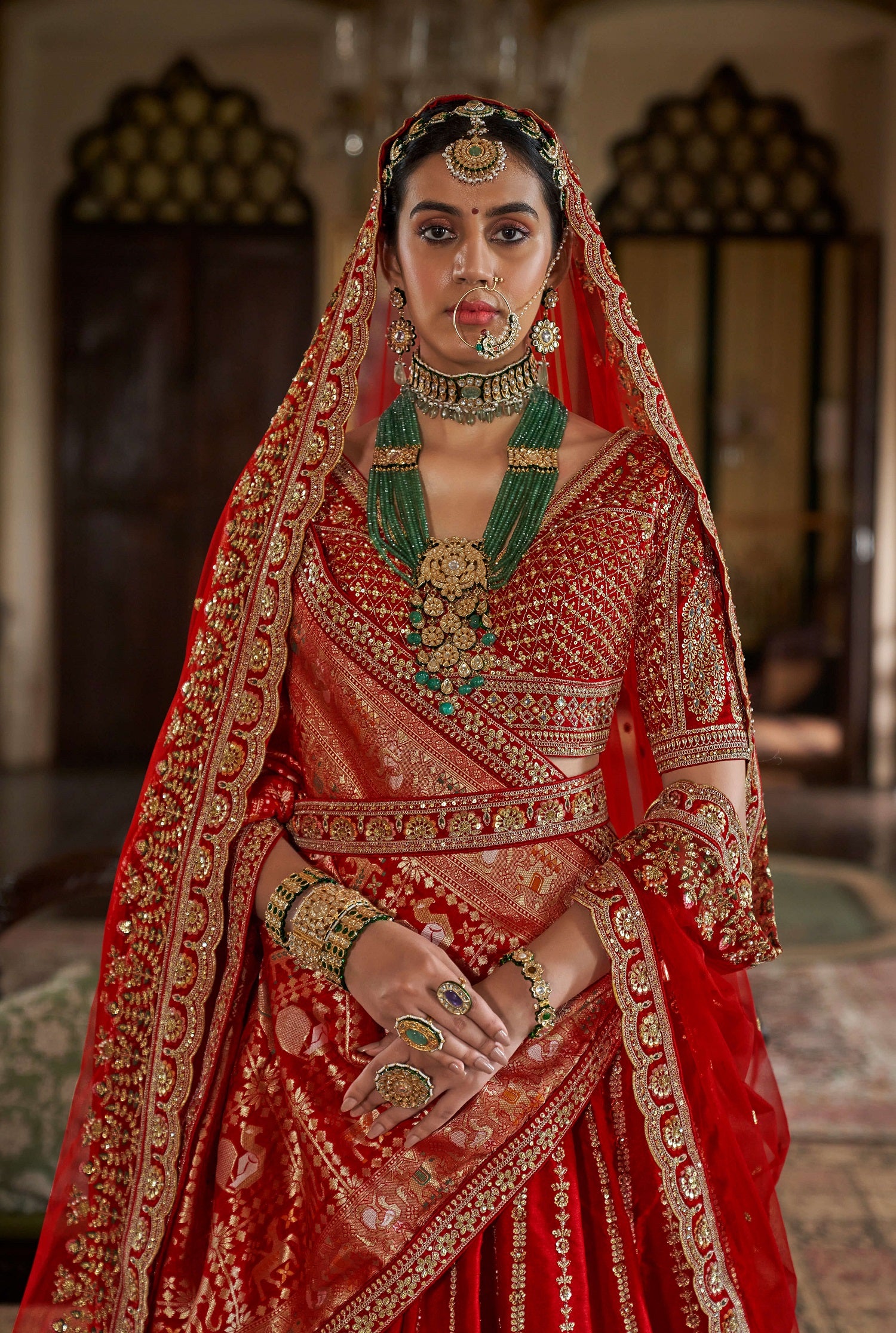 Designer Red Silk Bridal Lehenga with Heavy Embroidery & Sequins