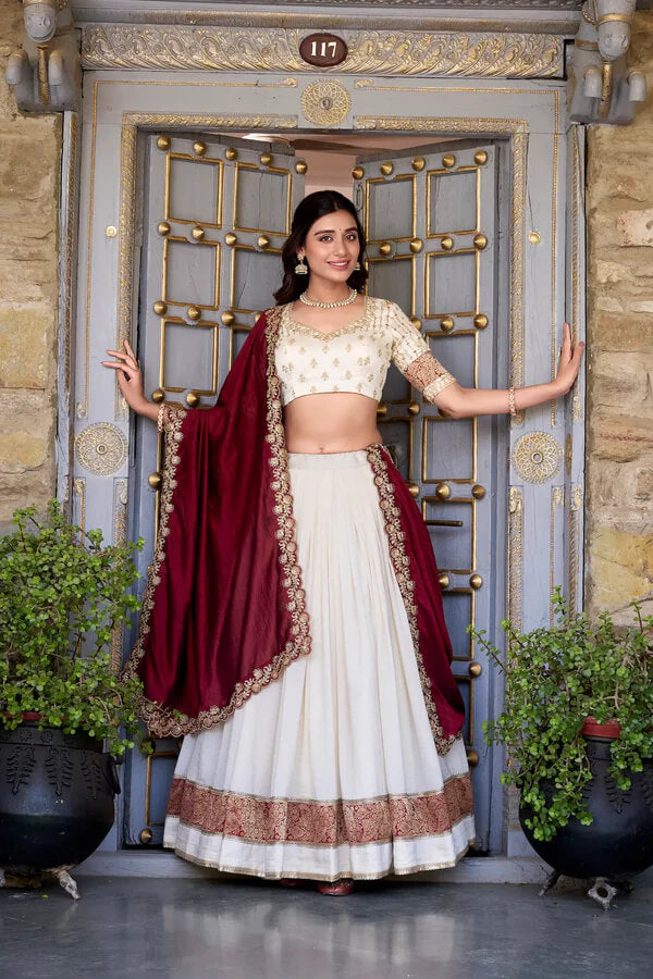 Off White Silk Lehenga with Zari Weaving and Sequins Accent