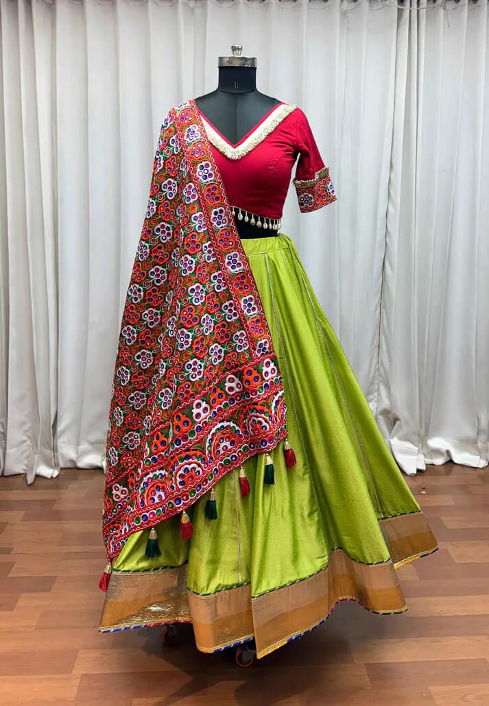 Trendy Green Embroidered Navratri Lehenga with Mirror Dupatta
