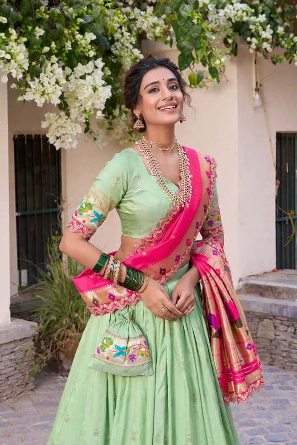 Pista Green Jacquard Silk Lehenga with Zari Weaving and Embroidered Border