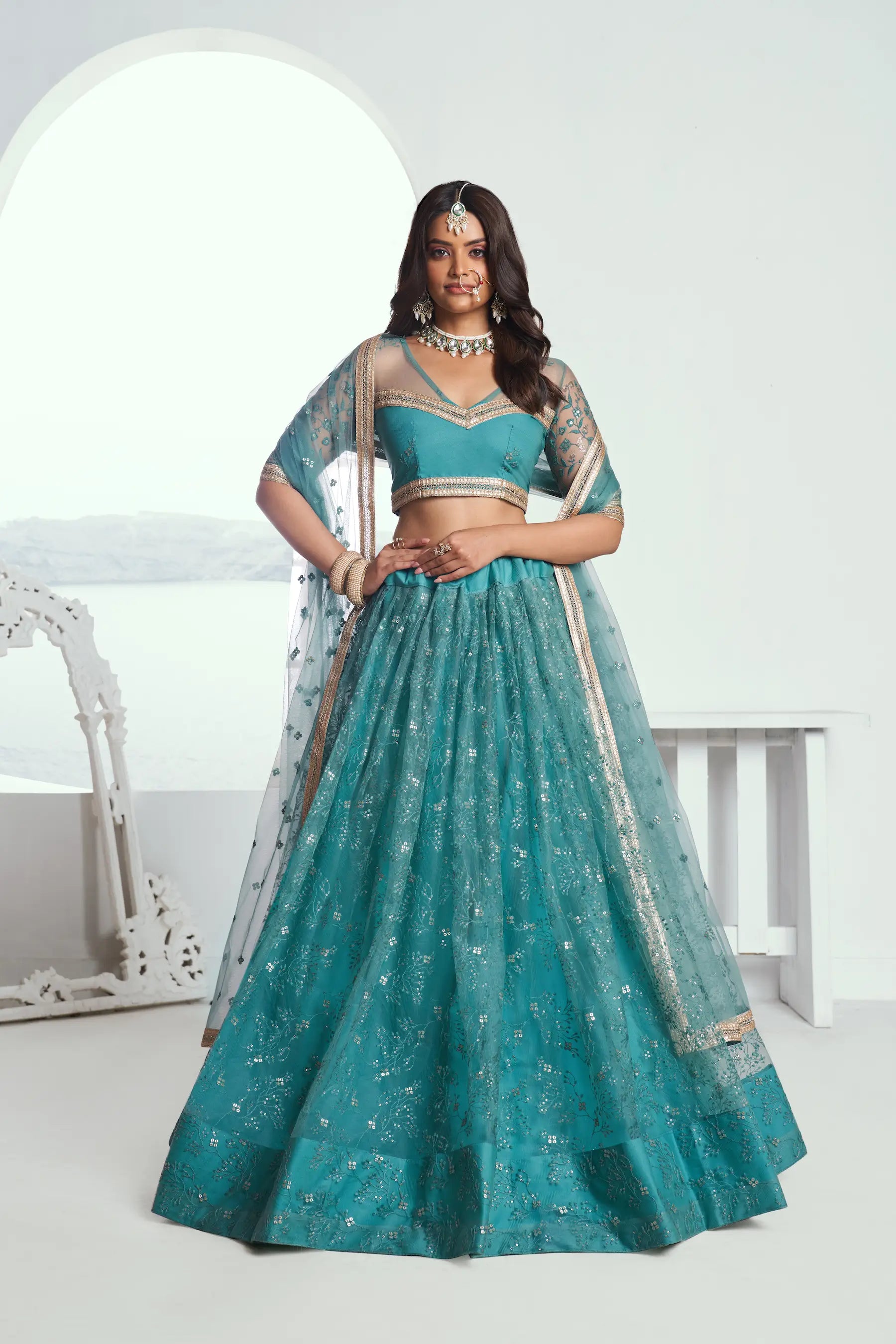 Fountain Blue Sequins Embroidered Net Lehenga Choli