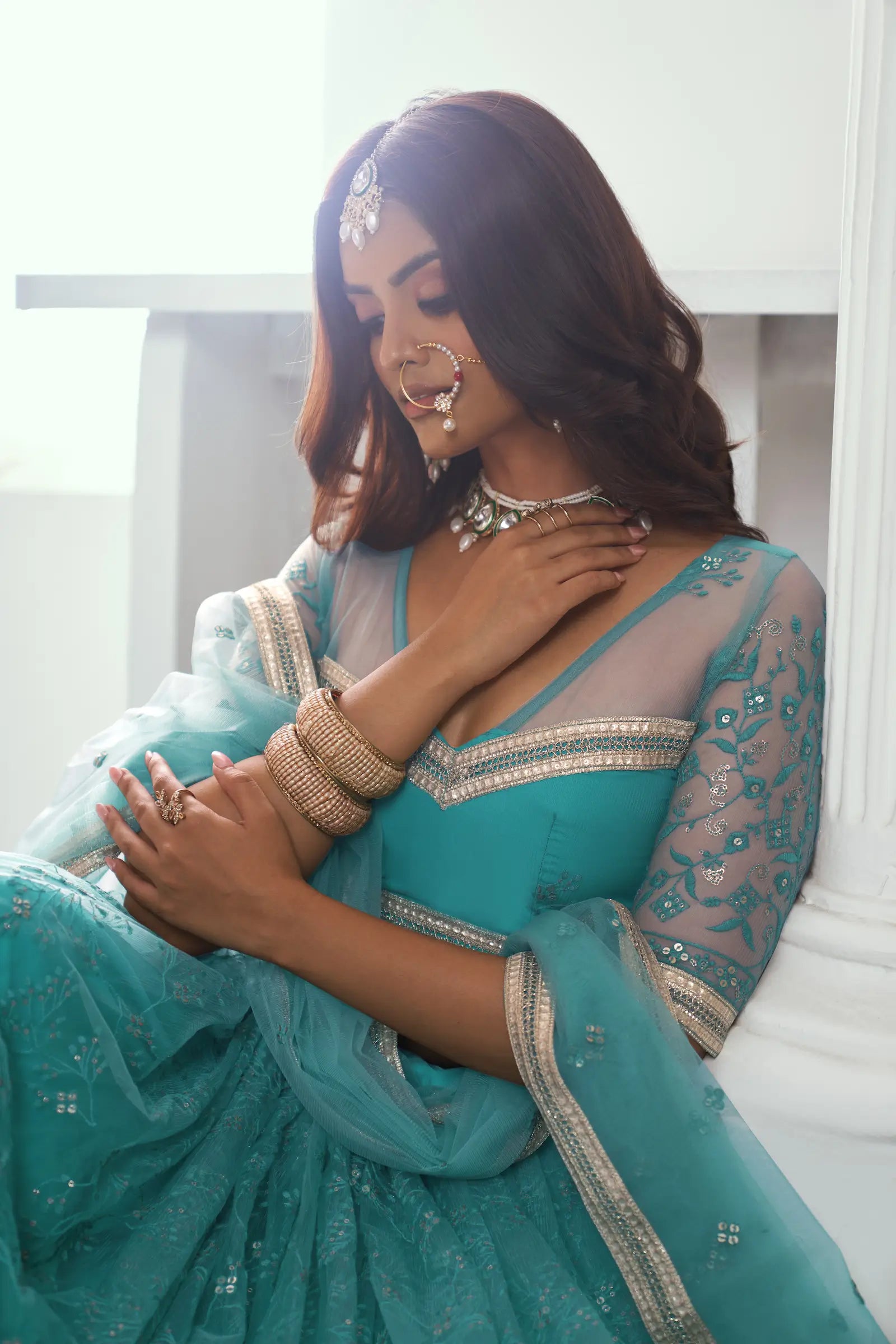 Fountain Blue Sequins Embroidered Net Lehenga Choli