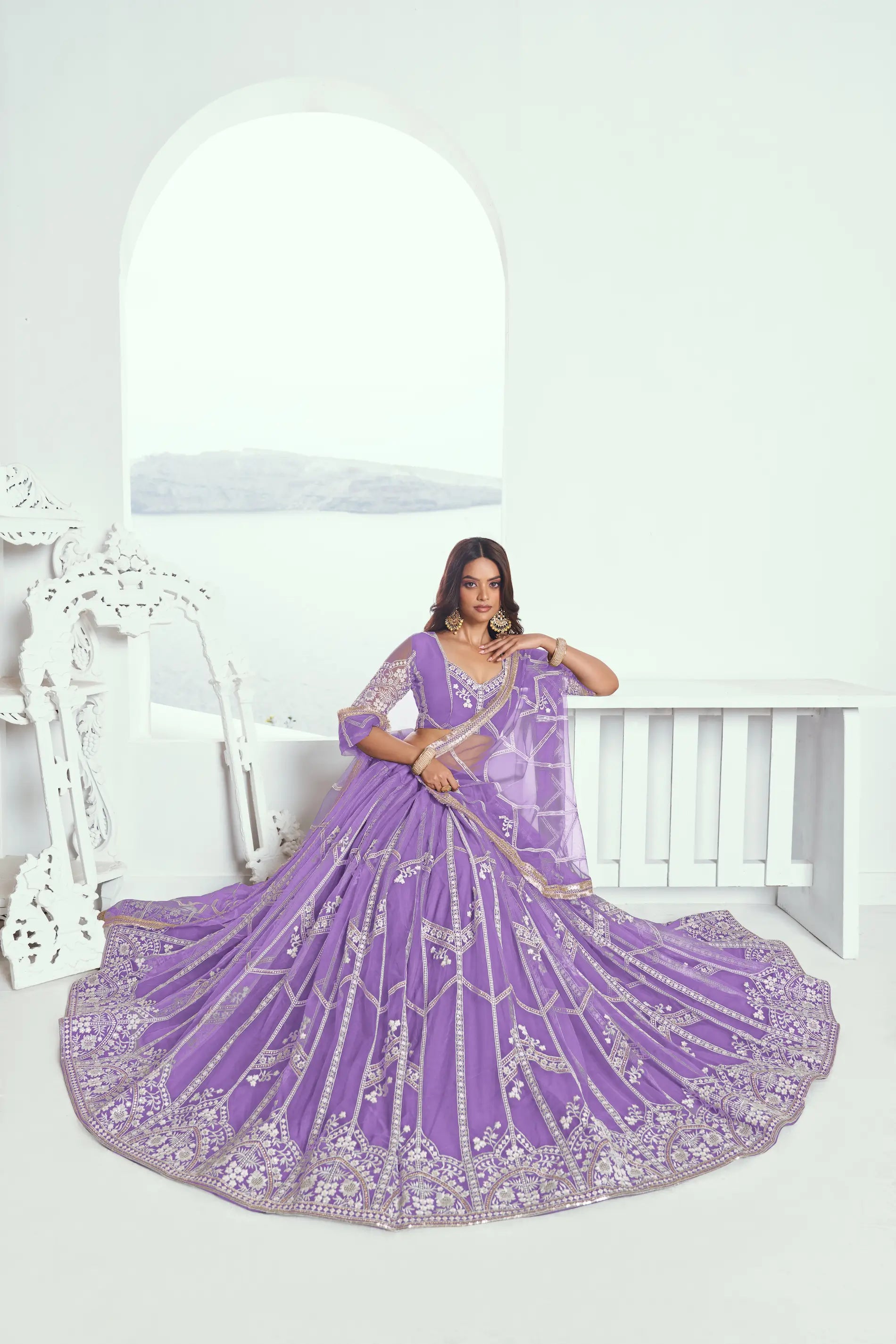 Soft Purple Sequins Embroidered Net Lehenga Choli