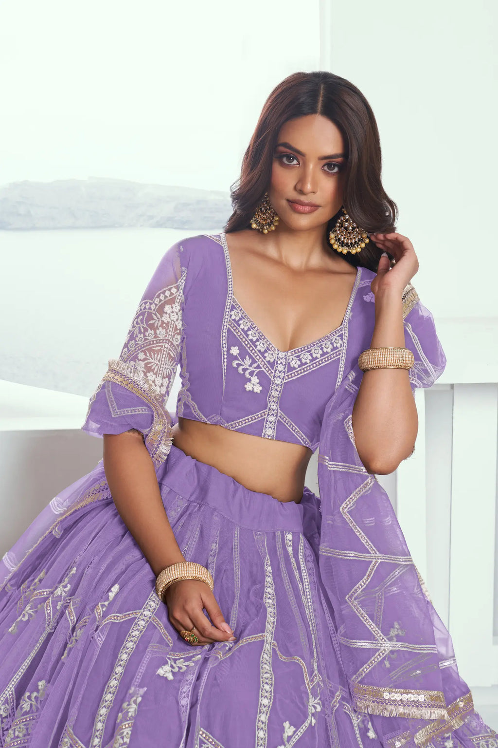Soft Purple Sequins Embroidered Net Lehenga Choli