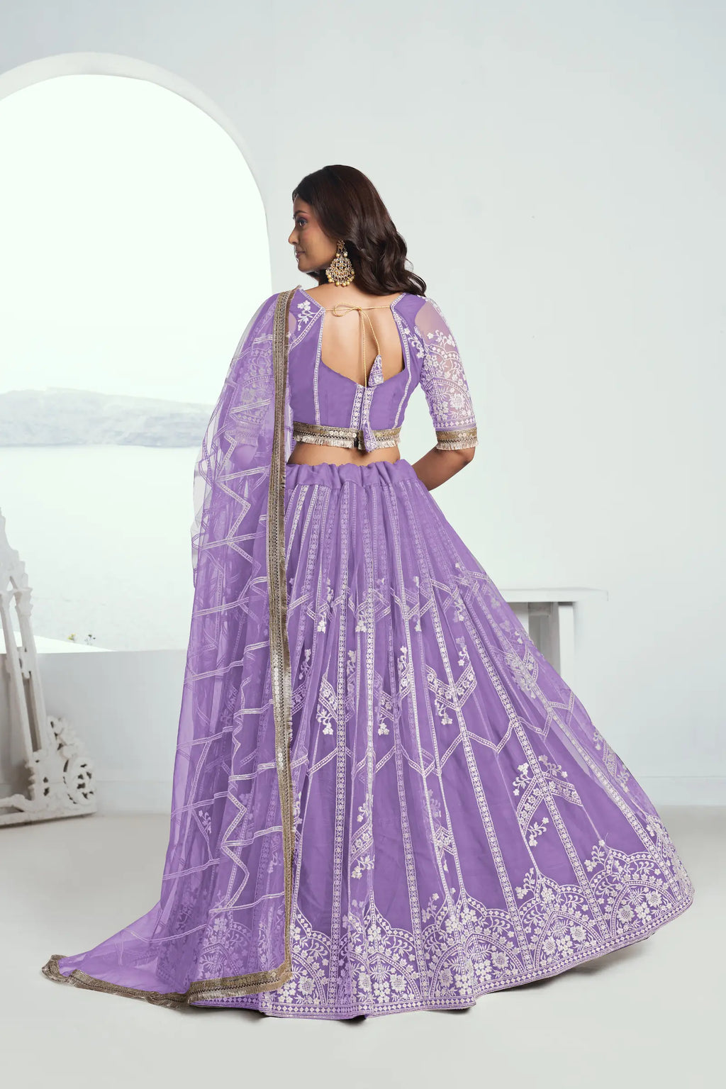 Soft Purple Sequins Embroidered Net Lehenga Choli