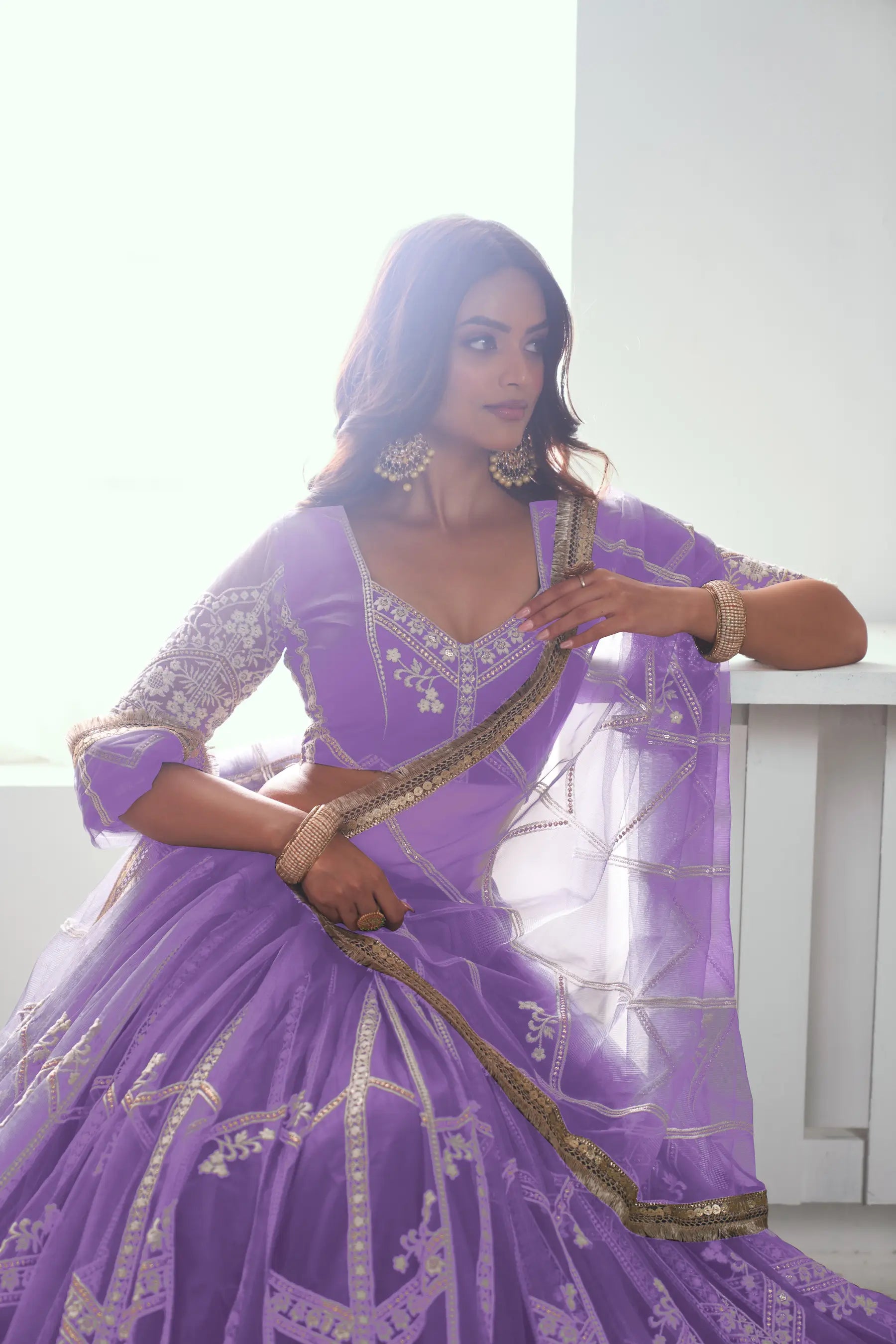 Soft Purple Sequins Embroidered Net Lehenga Choli