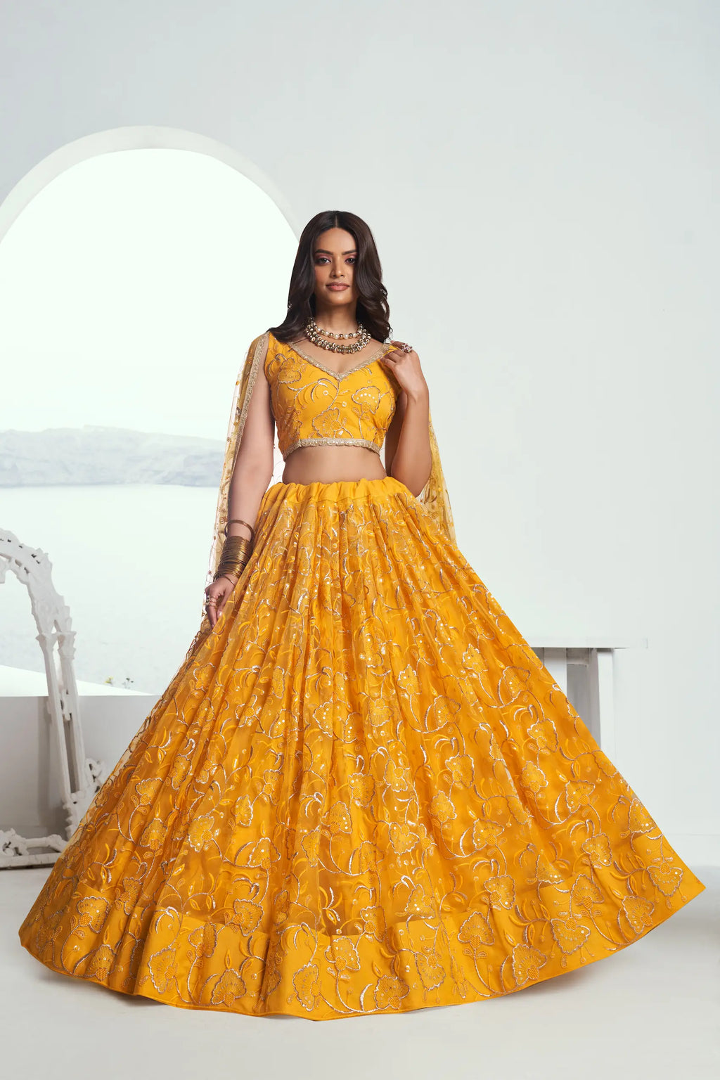 Dark Yellow Sequins Embroidered Net Lehenga Choli