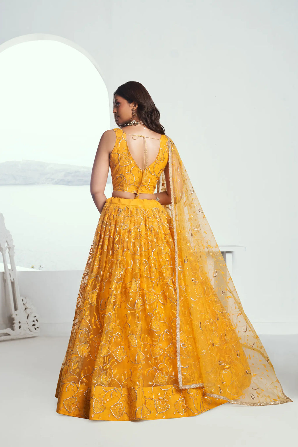Dark Yellow Sequins Embroidered Net Lehenga Choli
