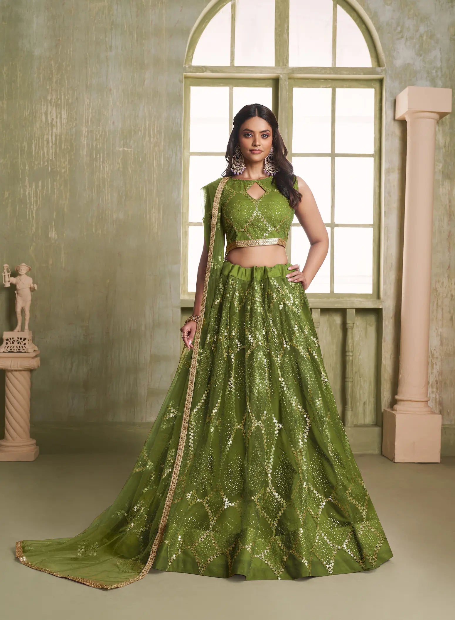 Leaf Green Net Lehenga Choli With Sequins Work