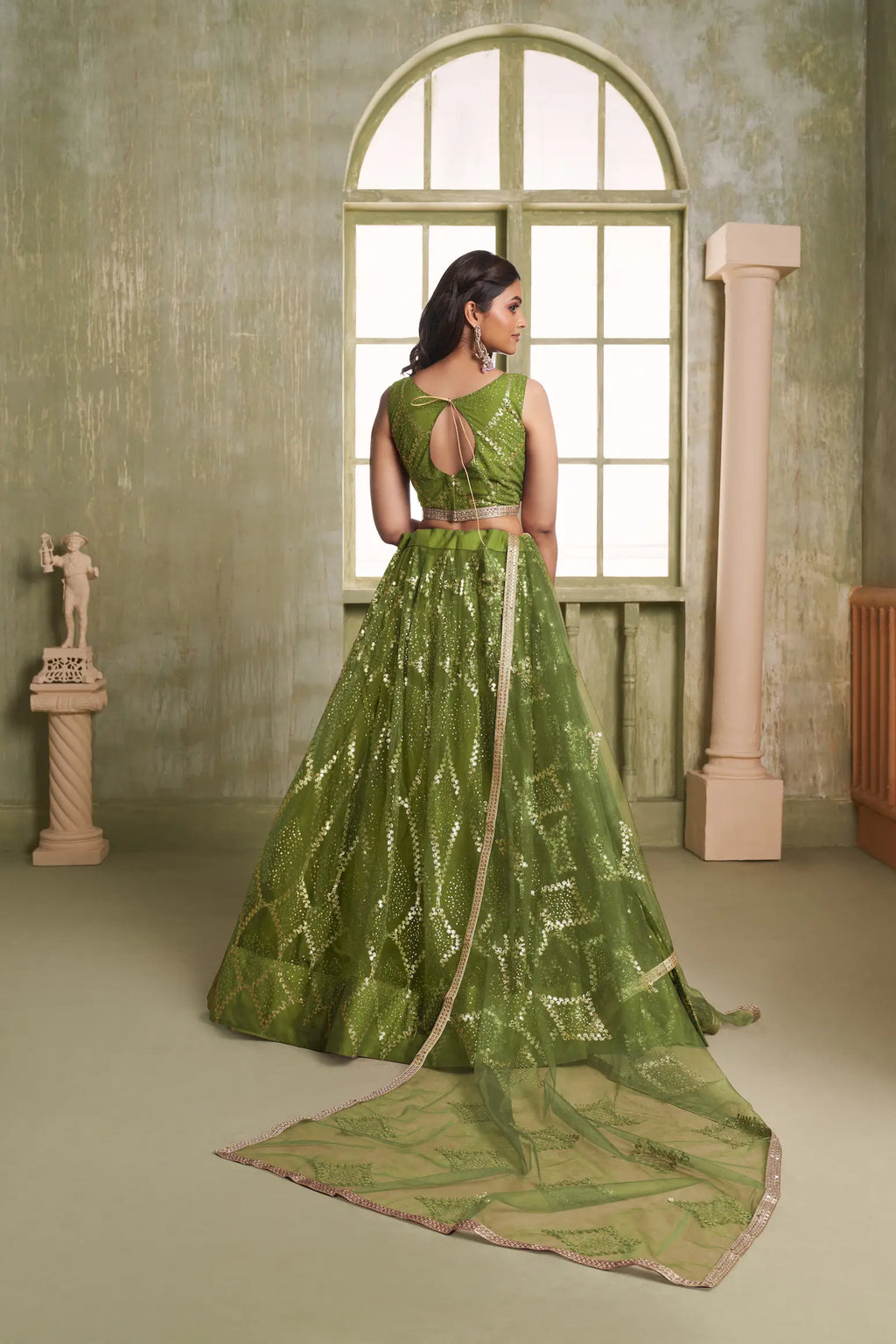Leaf Green Net Lehenga Choli With Sequins Work