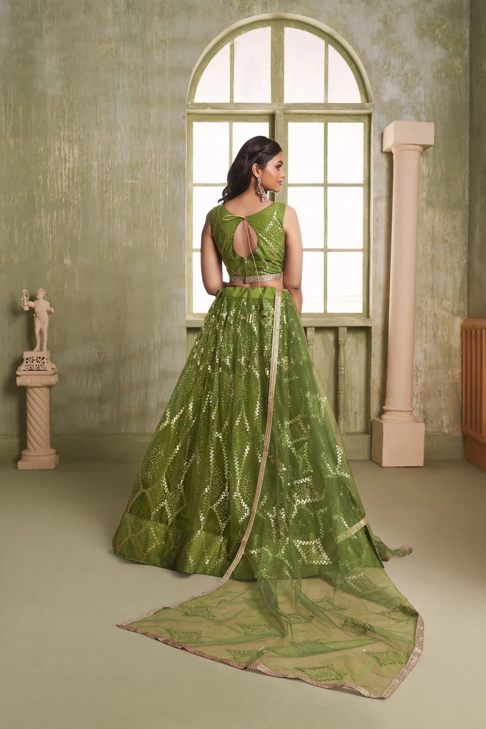 Leaf Green Net Lehenga Choli With Sequins Work