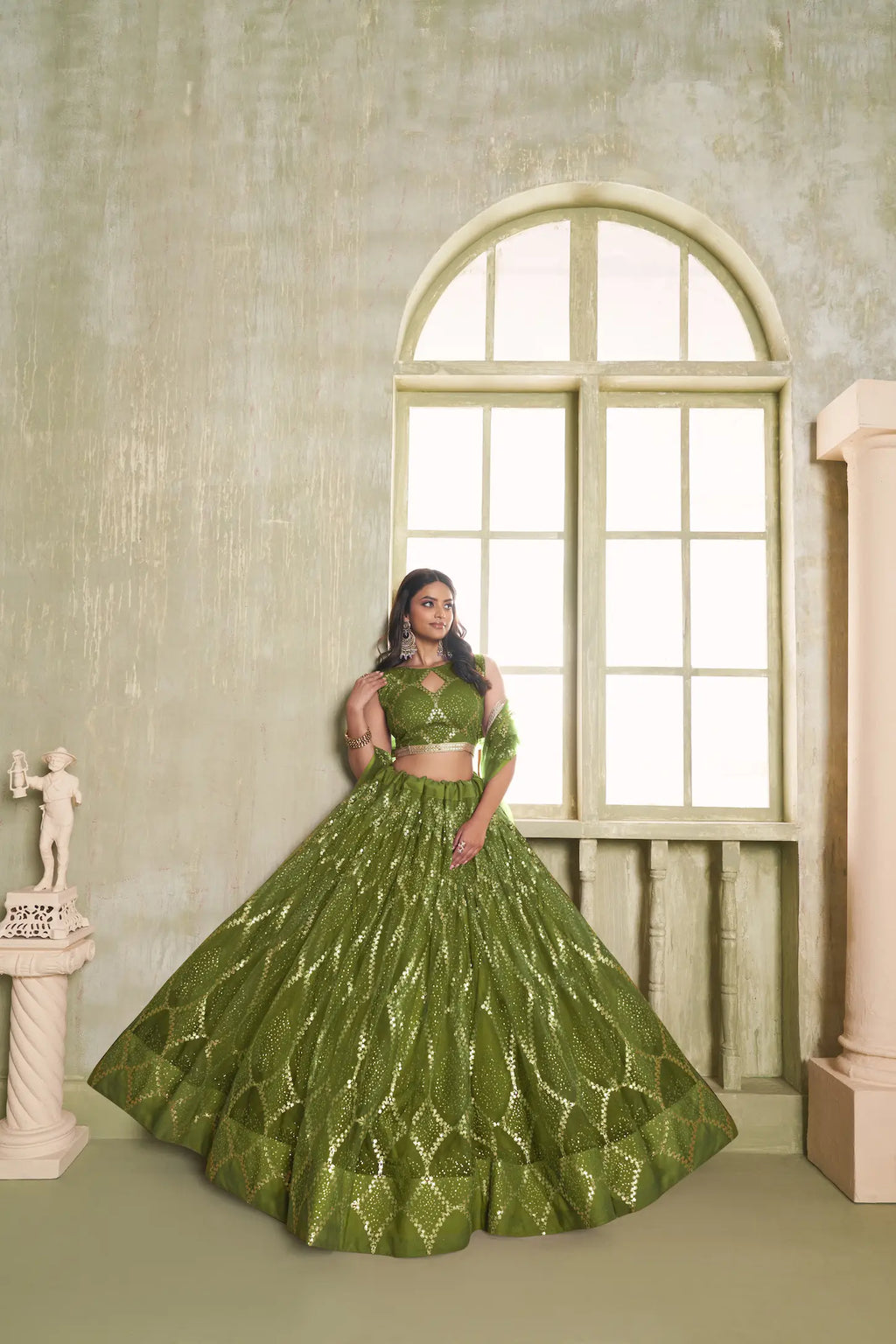 Leaf Green Net Lehenga Choli With Sequins Work