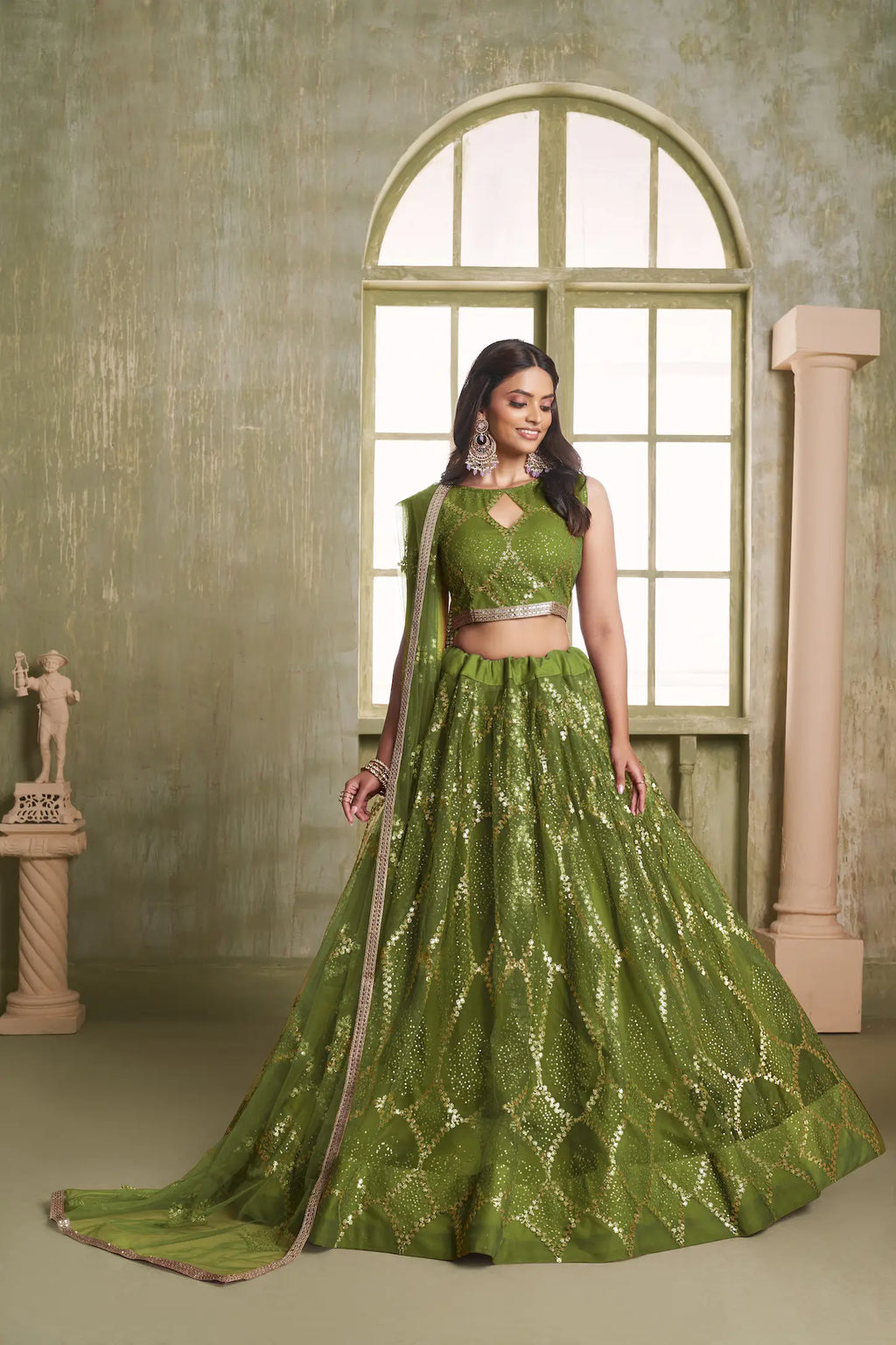 Leaf Green Net Lehenga Choli With Sequins Work