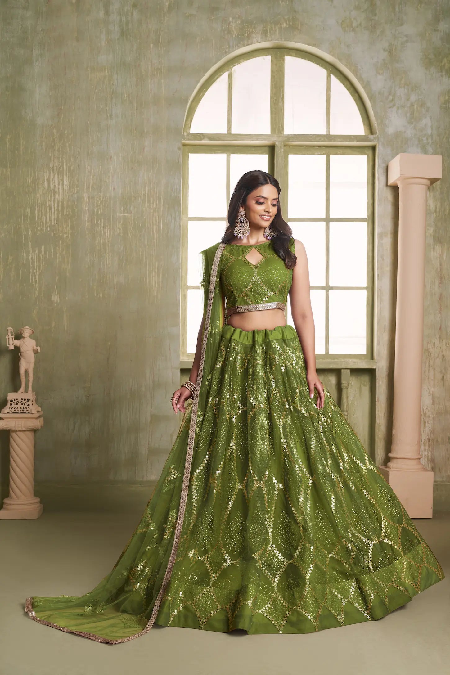 Leaf Green Net Lehenga Choli With Sequins Work