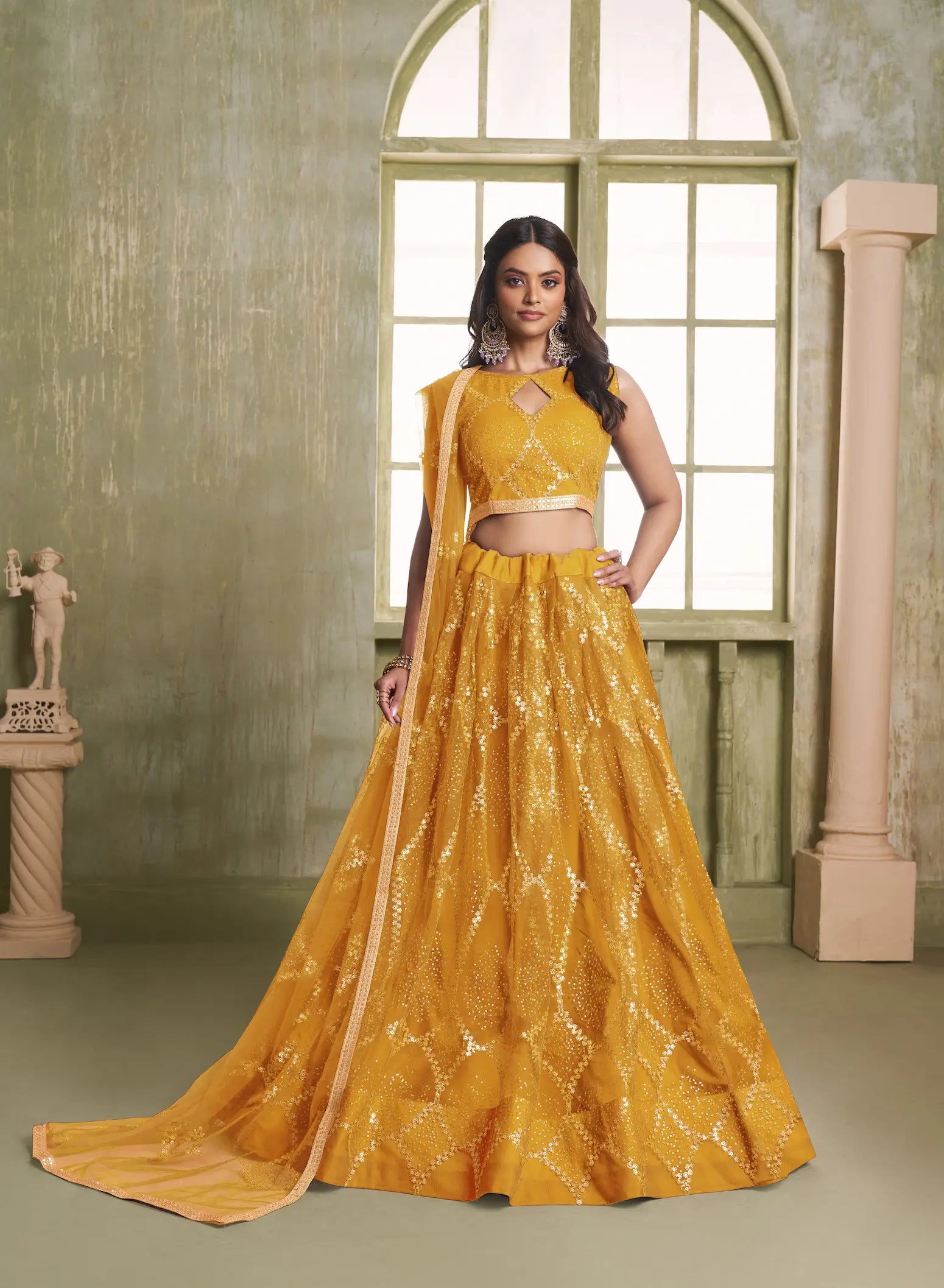 Yellow Net Lehenga Choli With Sequins Work