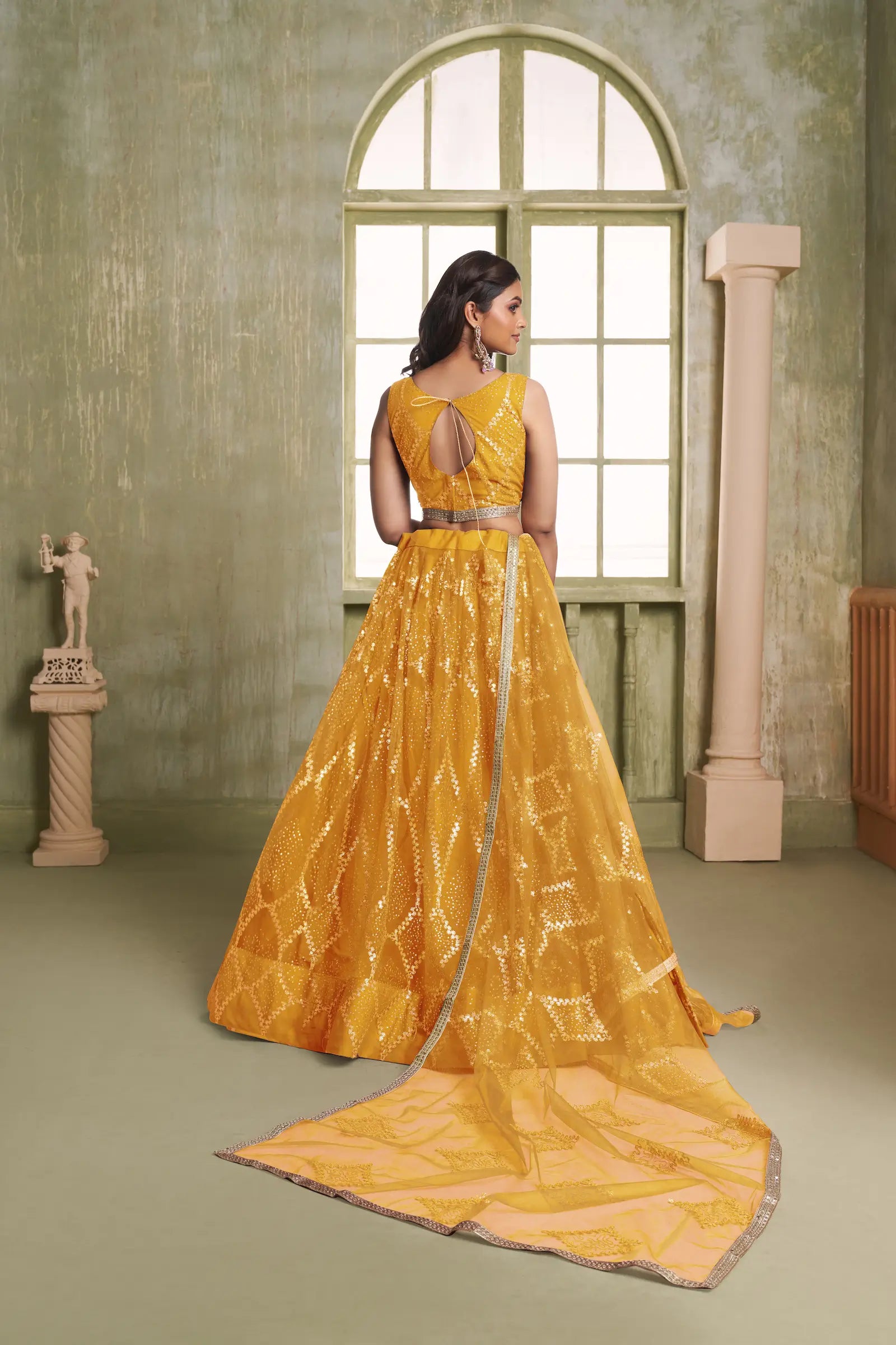Yellow Net Lehenga Choli With Sequins Work