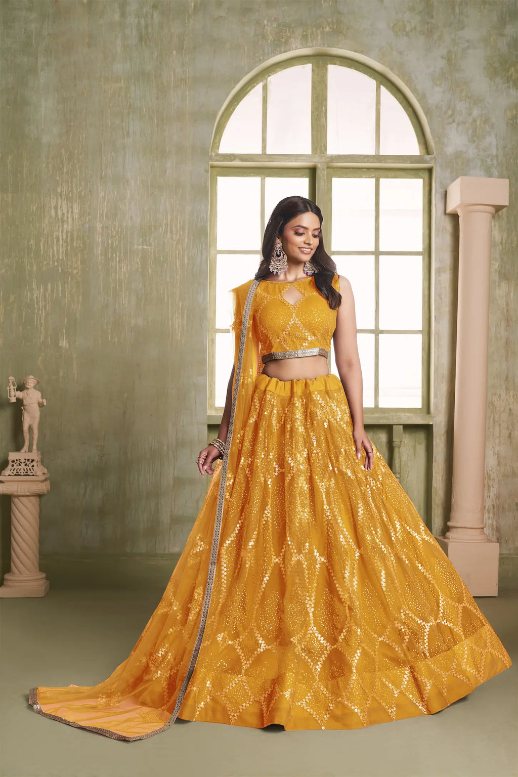 Yellow Net Lehenga Choli With Sequins Work