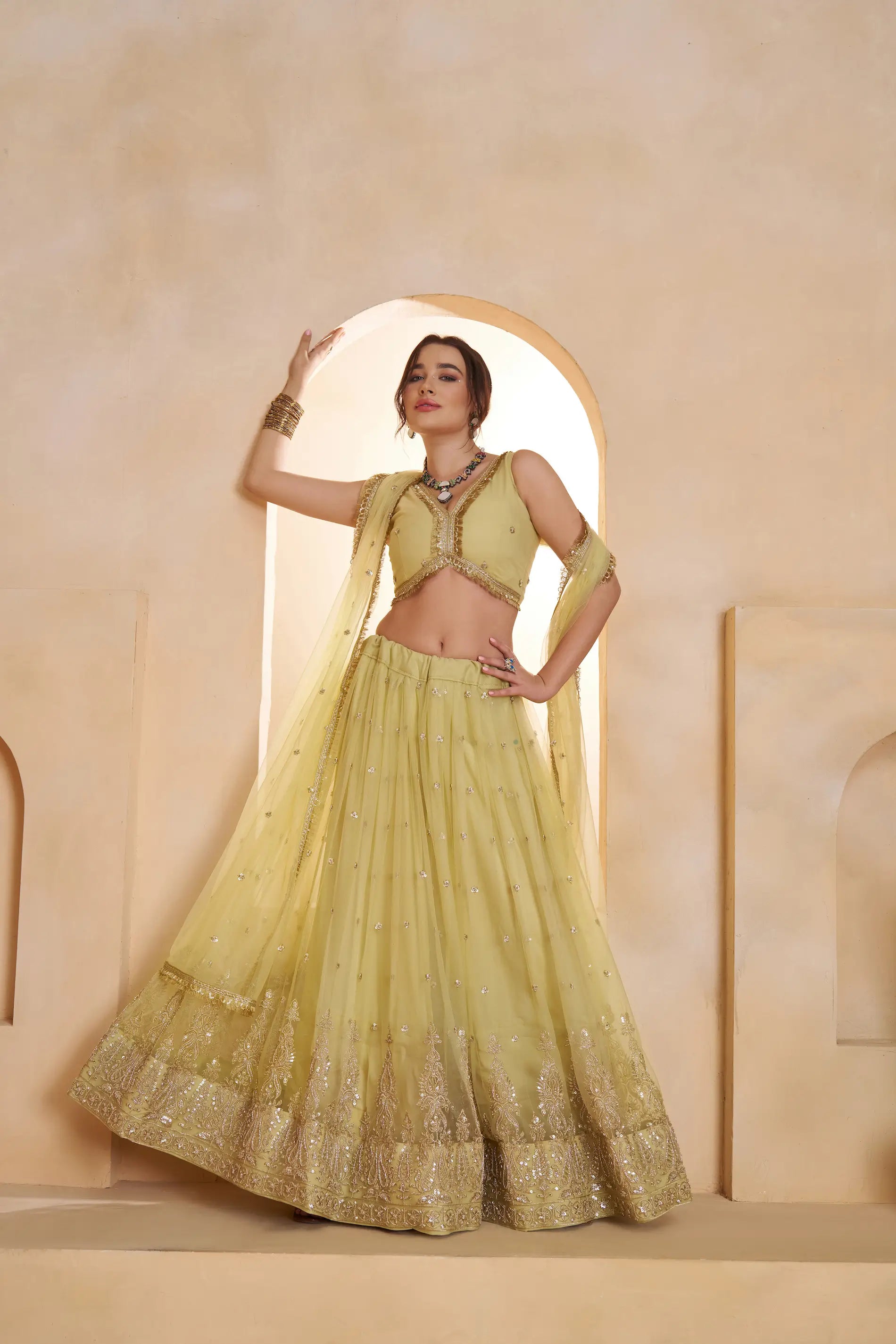 Pastel Yellow Beads Sequins Embroidery Net Lehenga