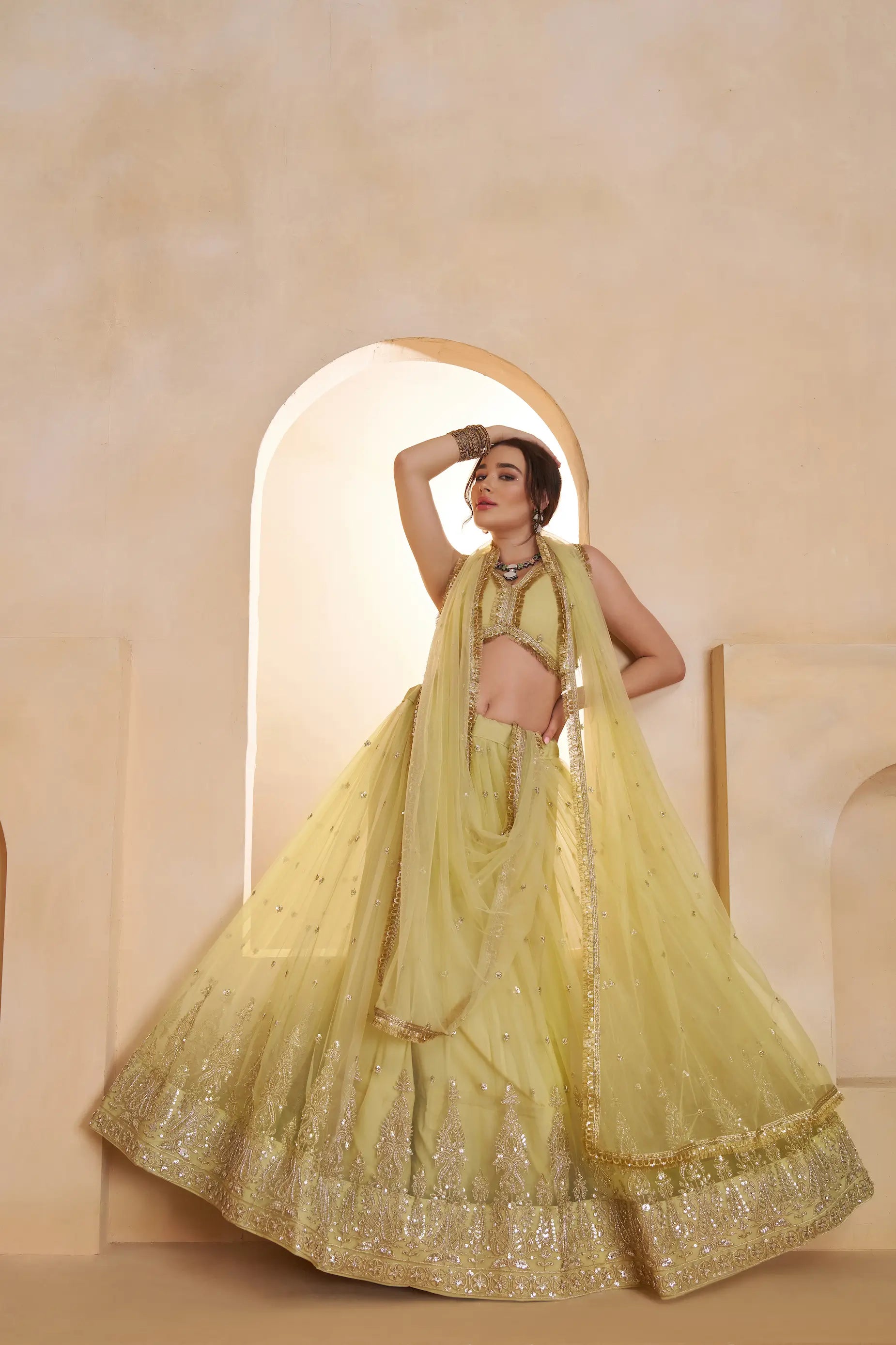Pastel Yellow Beads Sequins Embroidery Net Lehenga