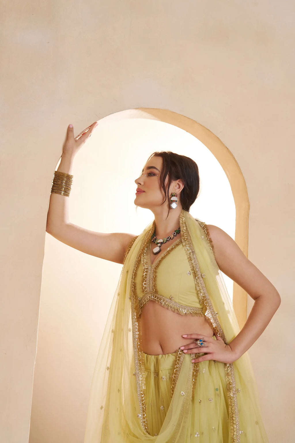 Pastel Yellow Beads Sequins Embroidery Net Lehenga