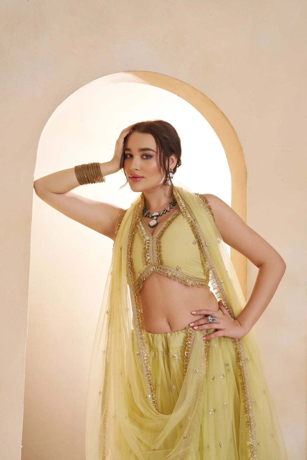 Pastel Yellow Beads Sequins Embroidery Net Lehenga