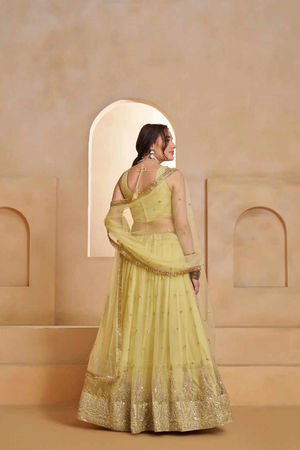 Pastel Yellow Beads Sequins Embroidery Net Lehenga