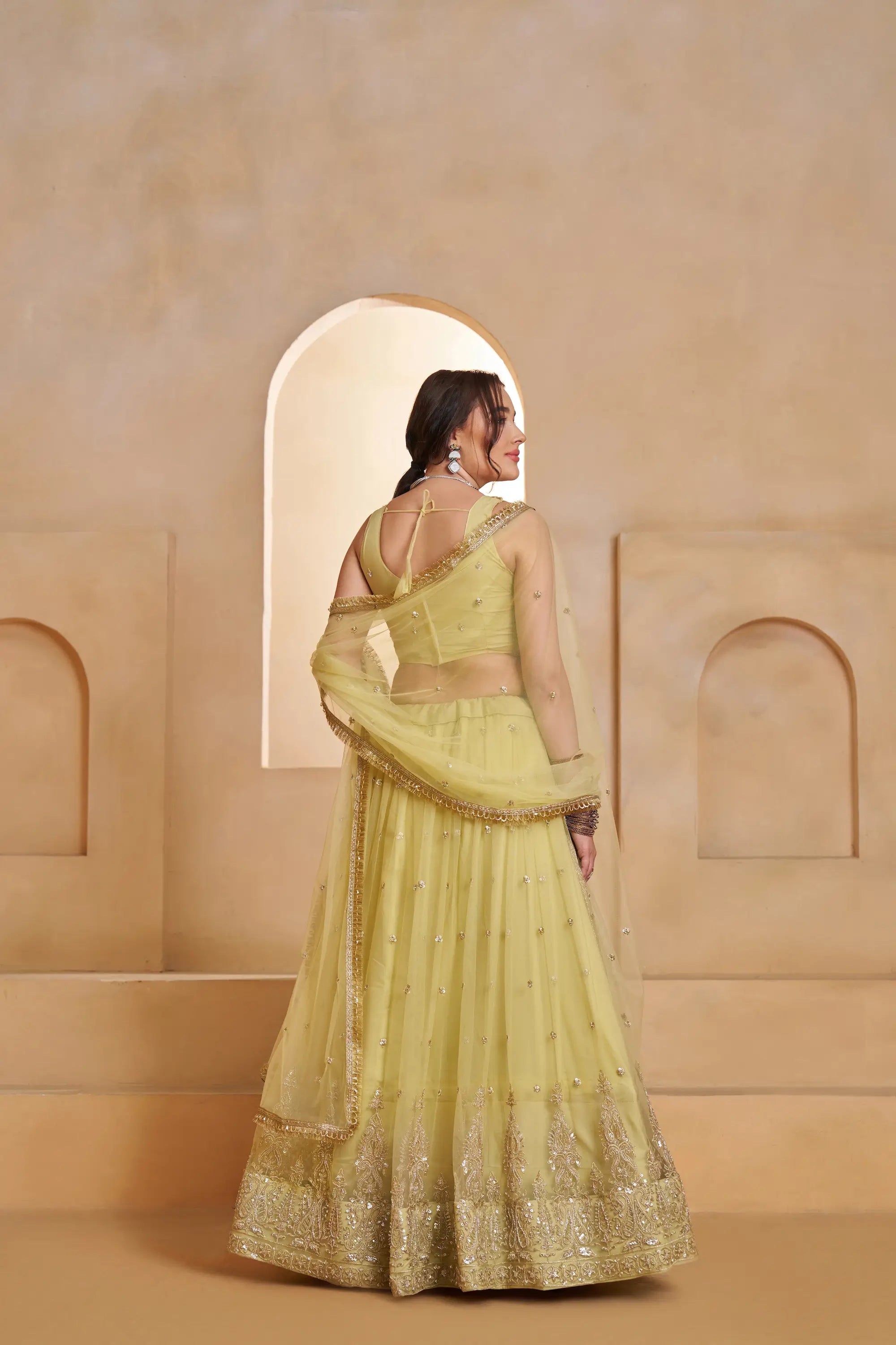 Pastel Yellow Beads Sequins Embroidery Net Lehenga