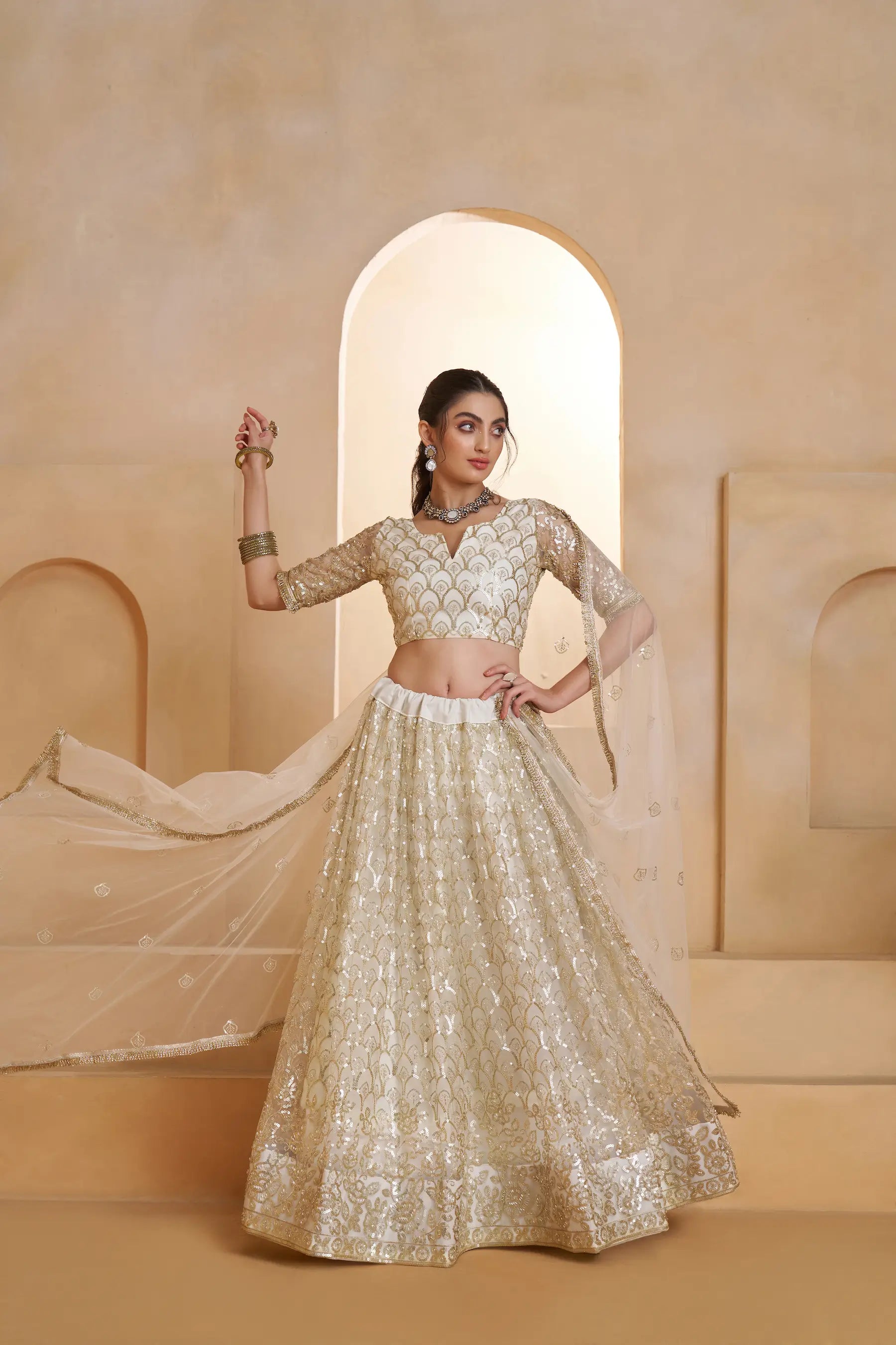 Ivory Gold Beads Sequins Embroidery Net Lehenga