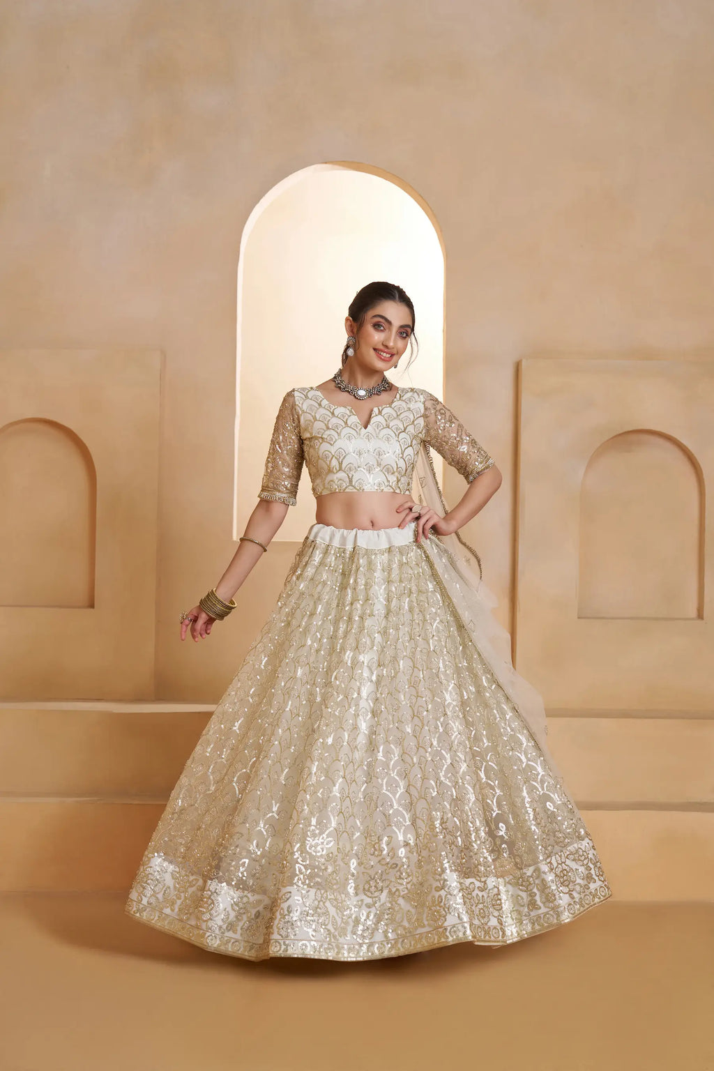 Ivory Gold Beads Sequins Embroidery Net Lehenga
