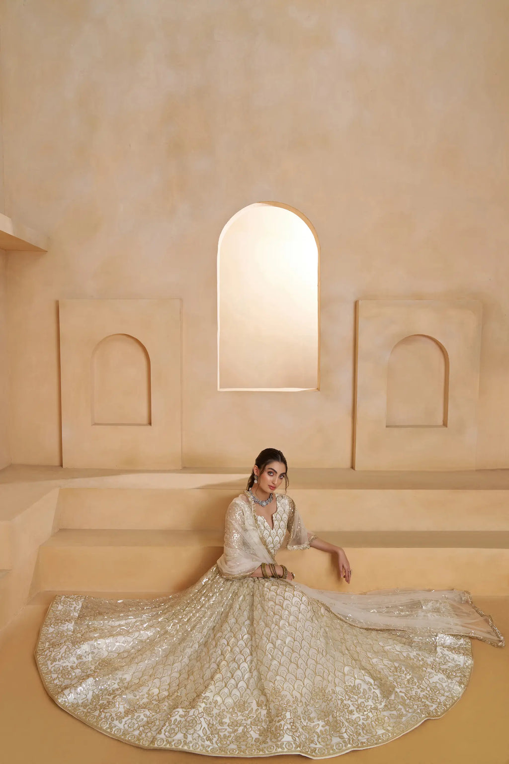 Ivory Gold Beads Sequins Embroidery Net Lehenga
