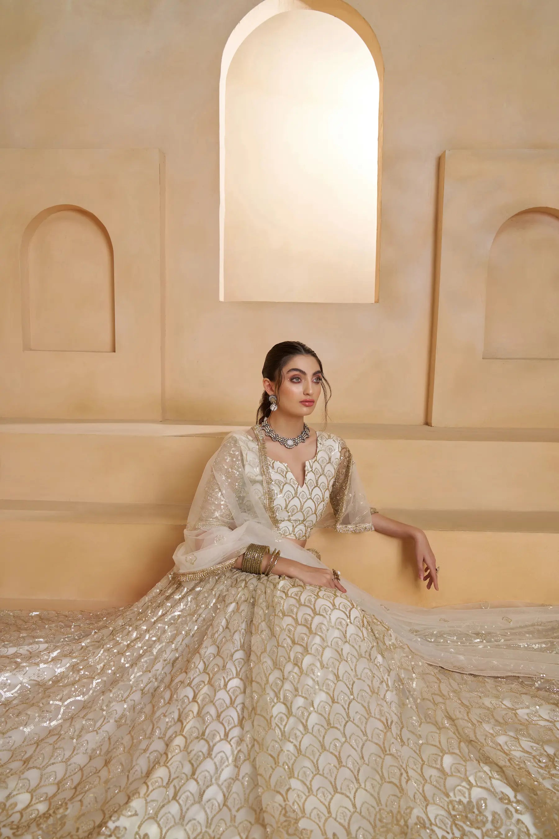 Ivory Gold Beads Sequins Embroidery Net Lehenga