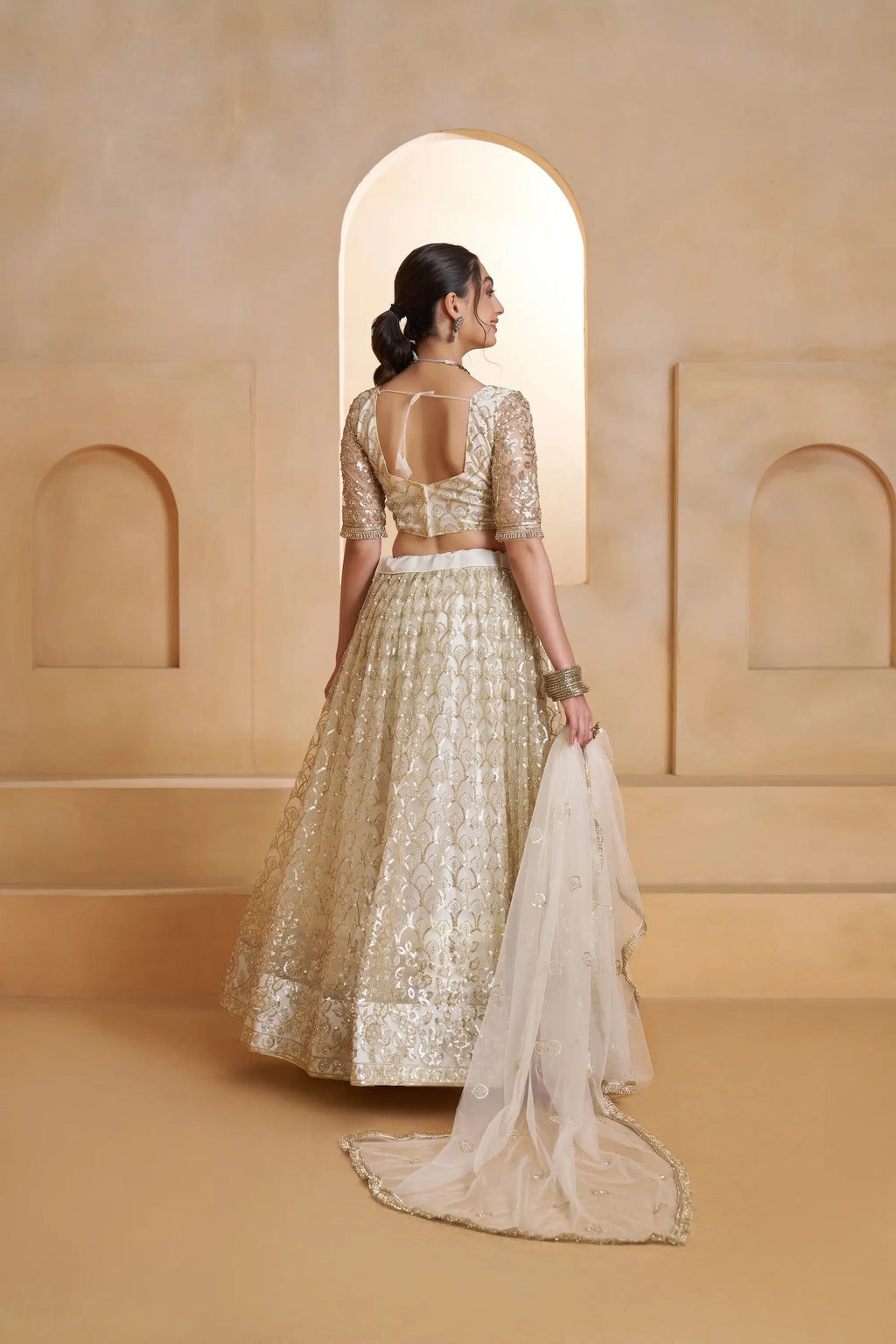 Ivory Gold Beads Sequins Embroidery Net Lehenga