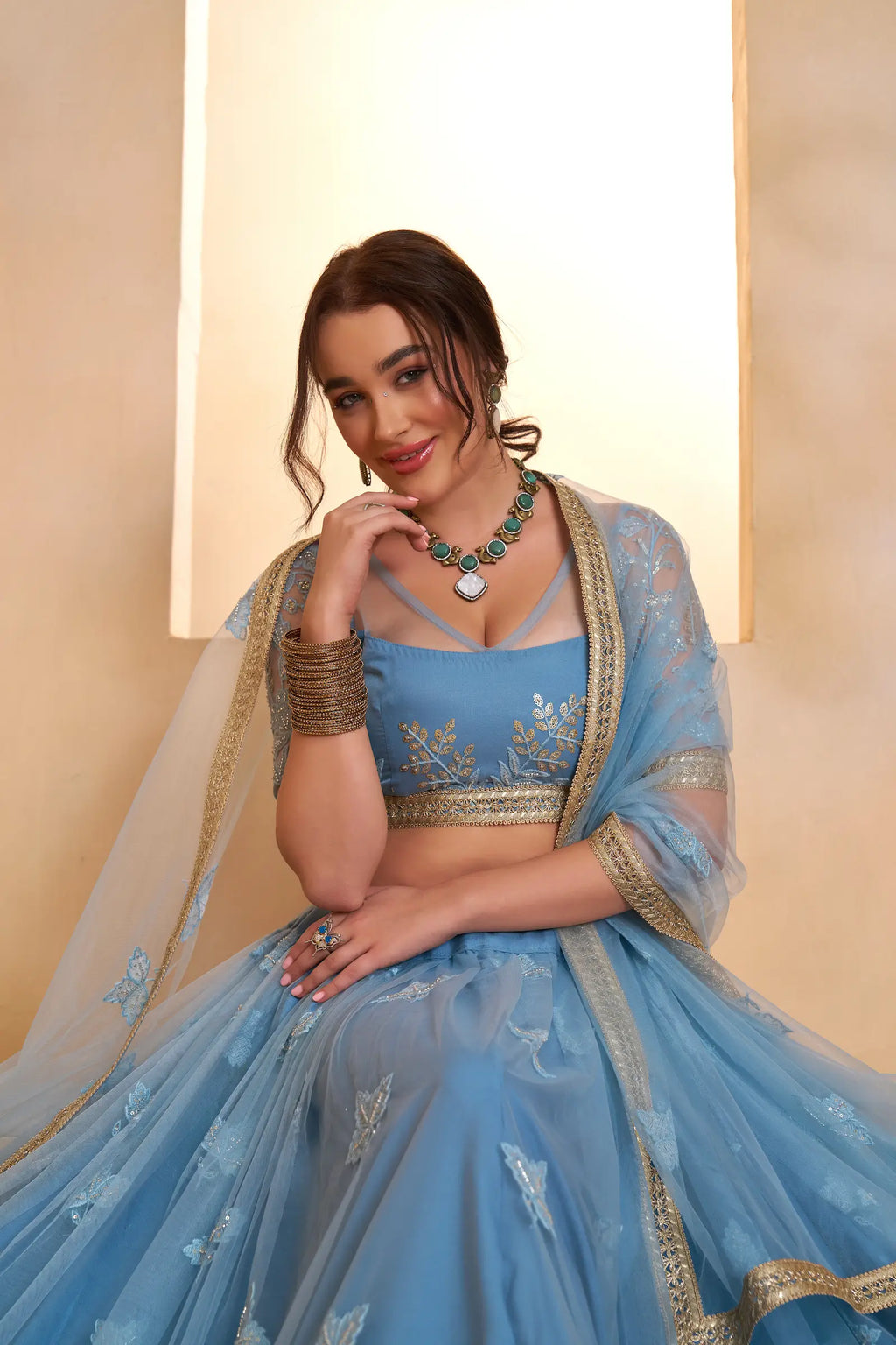 Blue Beads Sequins Embroidered Net Lehenga Choli