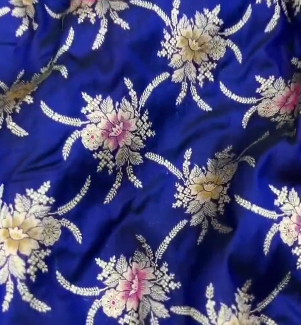 Azure Blue Handloom Banarasi Katan Silk Saree with Colorful Meenakari Floral Borders and Silk Mark Authenticity Label.