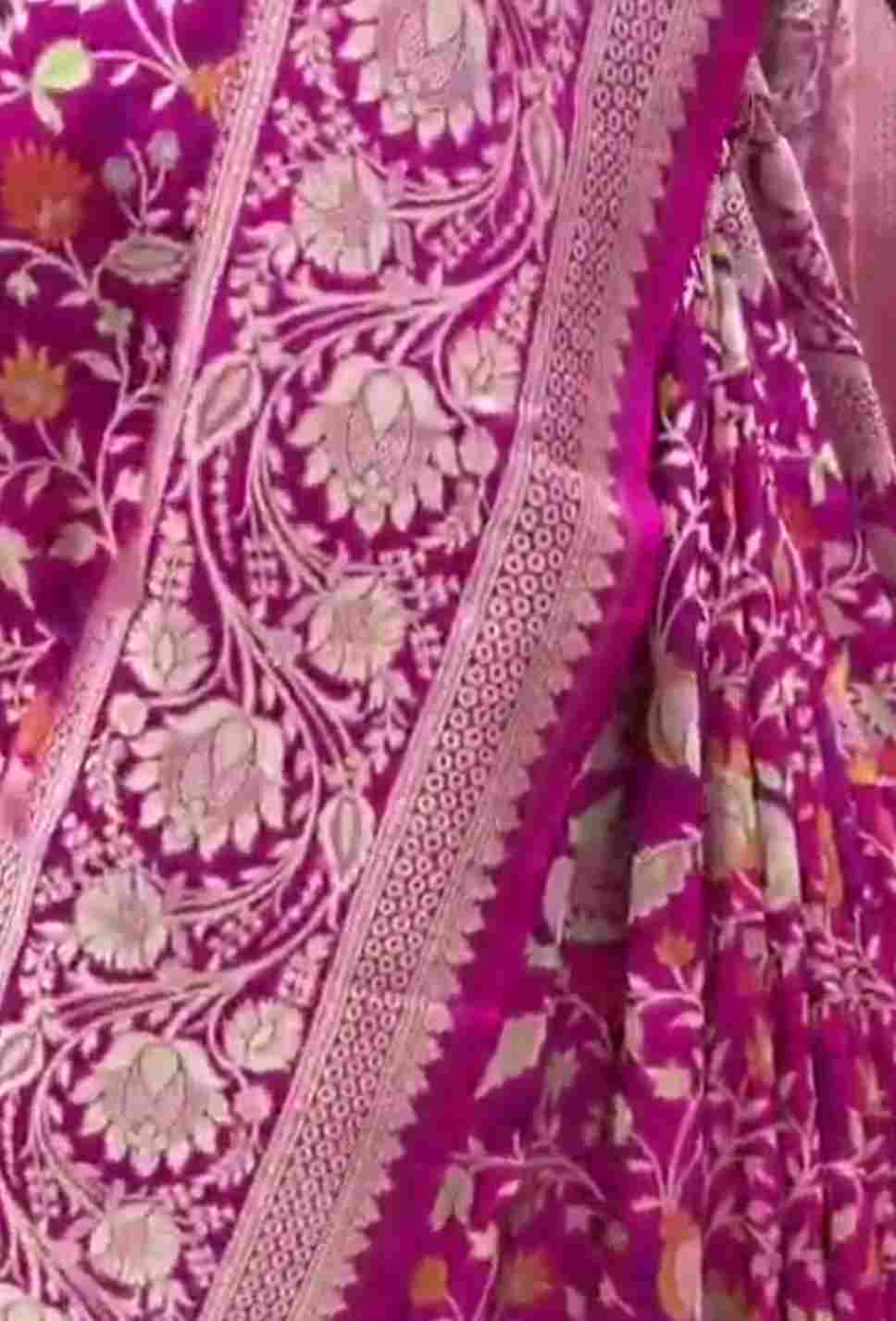 Royal hot pink Katan silk saree with vibrant three-colored Tilfi Meenakari floral buttas and a rich gold zari border.