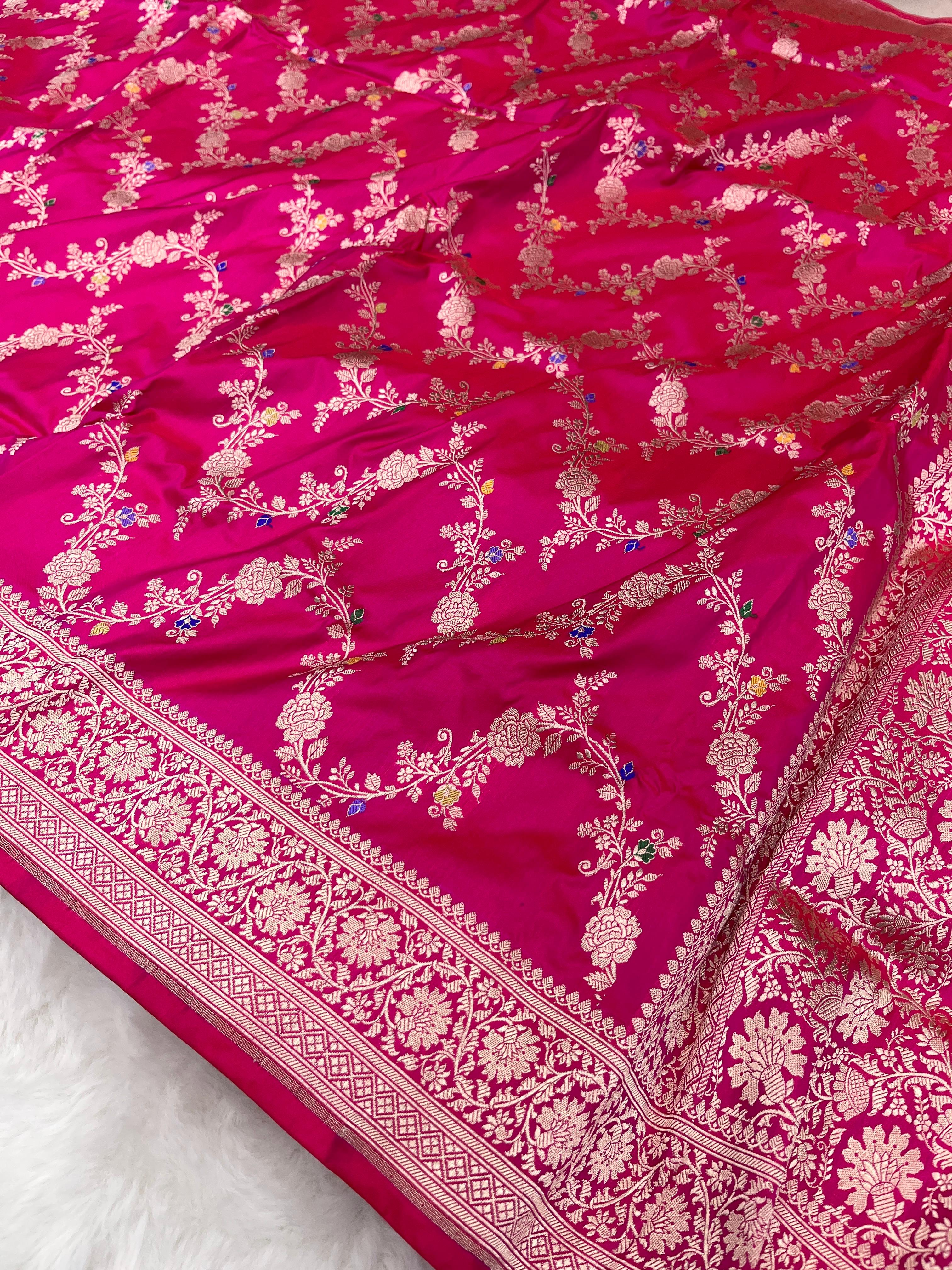 Rani pink Banarasi handloom pure Katan silk Kaduwa Jangla Meenakari saree featuring intricate gold zari and multi-color floral motifs