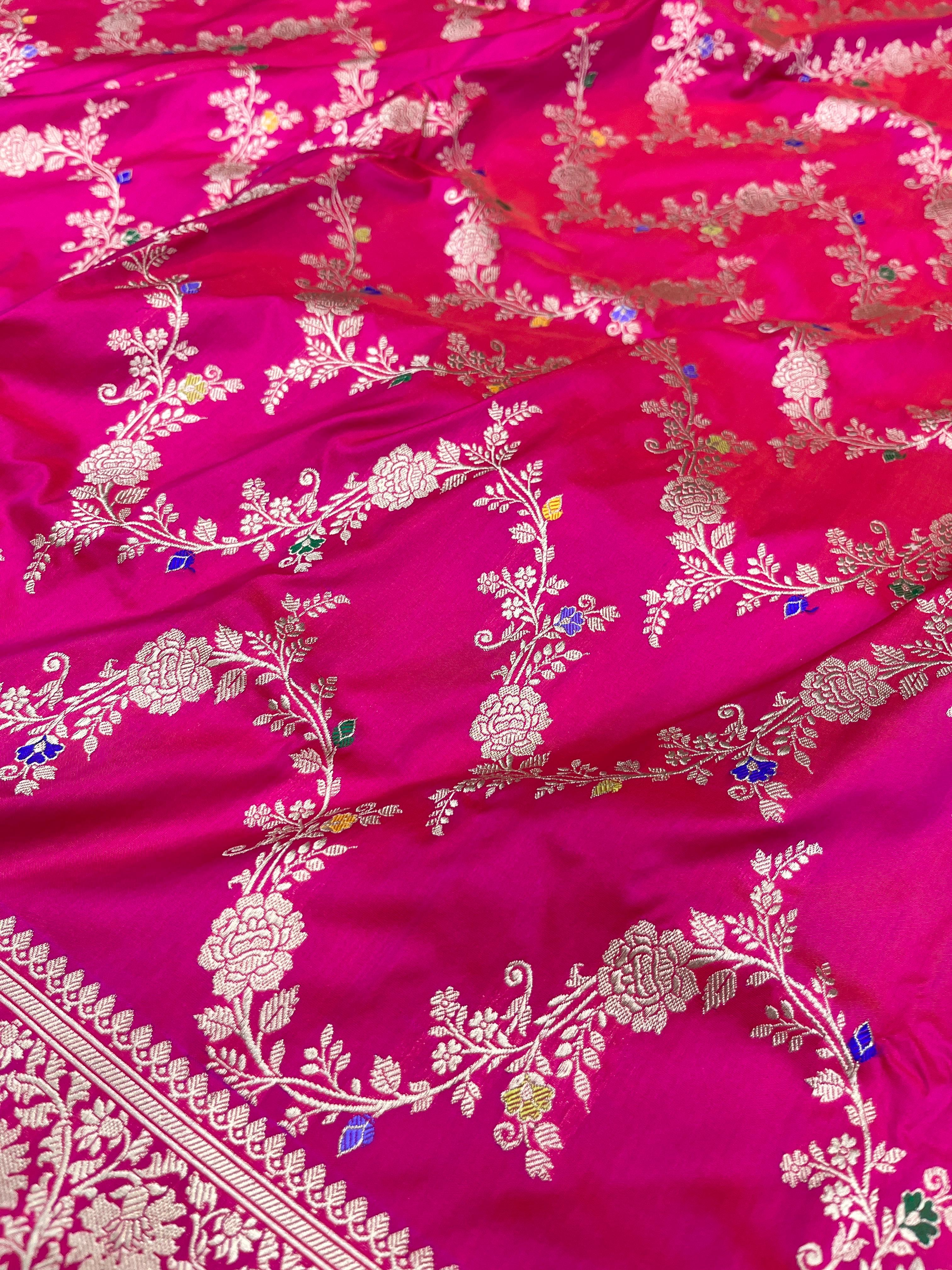 Rani pink Banarasi handloom pure Katan silk Kaduwa Jangla Meenakari saree featuring intricate gold zari and multi-color floral motifs