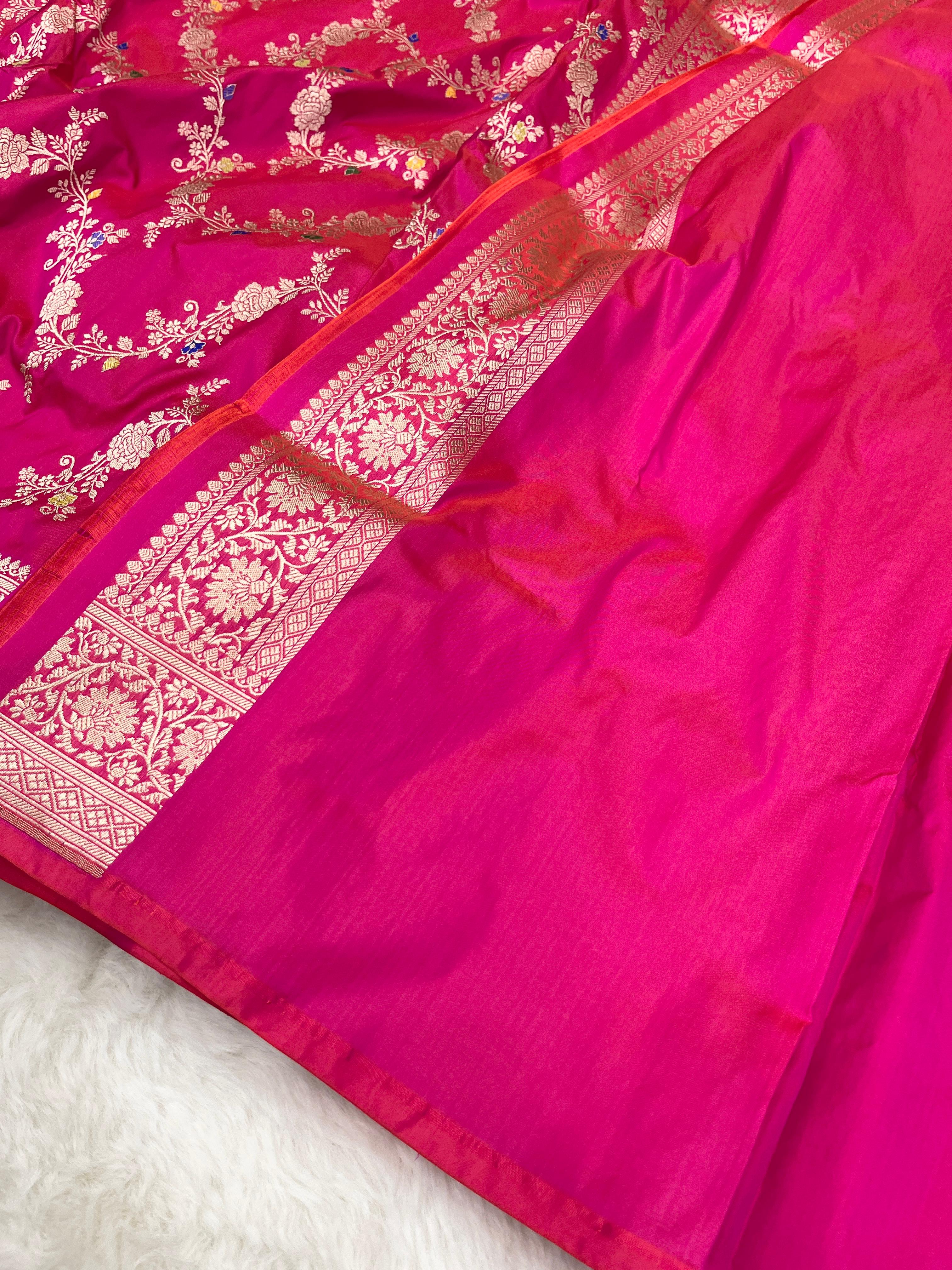 Rani pink Banarasi handloom pure Katan silk Kaduwa Jangla Meenakari saree featuring intricate gold zari and multi-color floral motifs