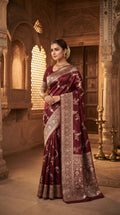 Maroon Banarasi Handloom Pure Katan Silk Kaduwa Jangla Meenakari Saree featuring intricate multi-color floral weaving and gold zari work.