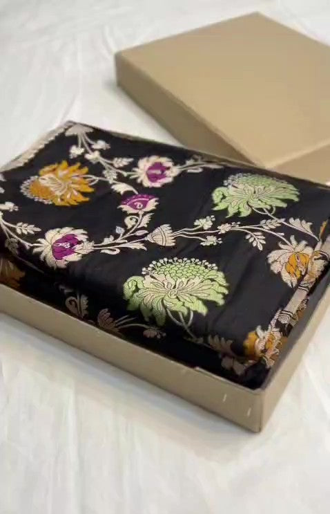 Midnight Black Handloom Banarasi Katan Silk Saree with Vibrant Meenakari Floral Motifs and Silk Mark Label.