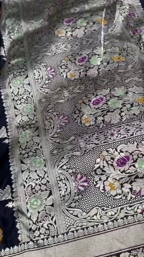 Midnight Black Handloom Banarasi Katan Silk Saree with Vibrant Meenakari Floral Motifs and Silk Mark Label.