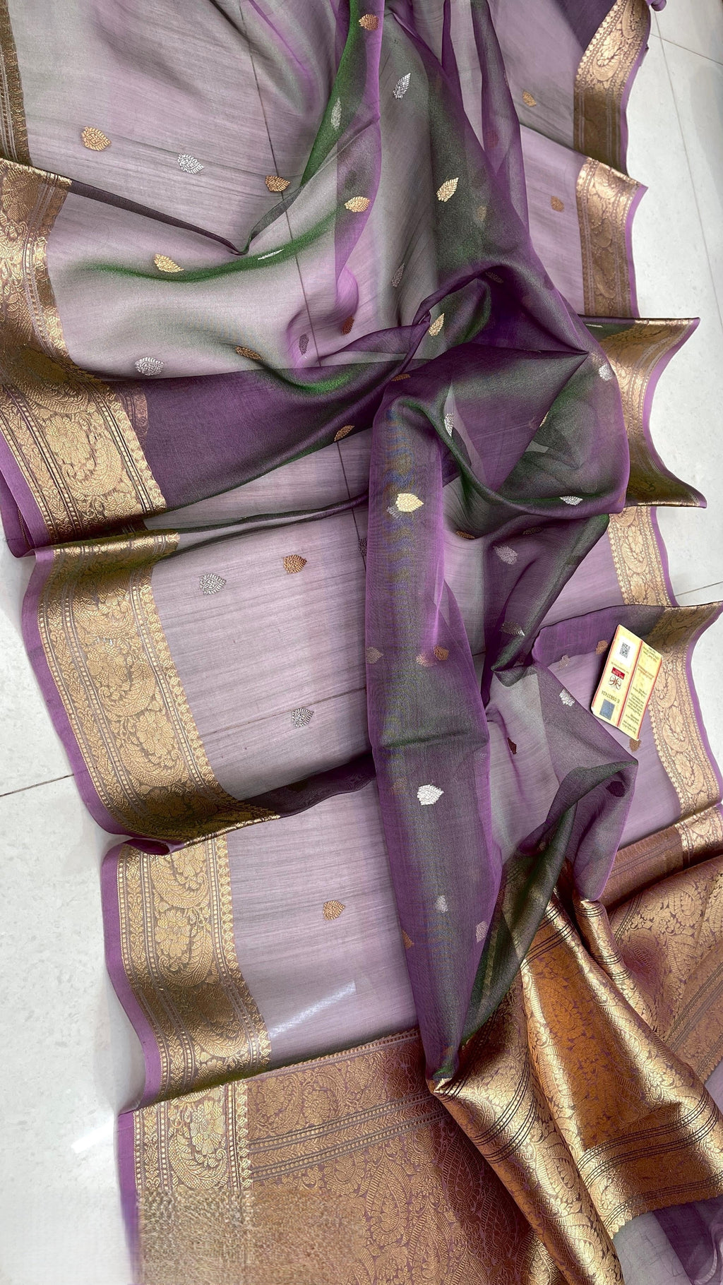 Dual Tone Purple Banarasi Handloom Kora Tissue Silk Saree featuring all-over gold and silver zari buttas, intricate gold zari borders, and a matching rich pallu.