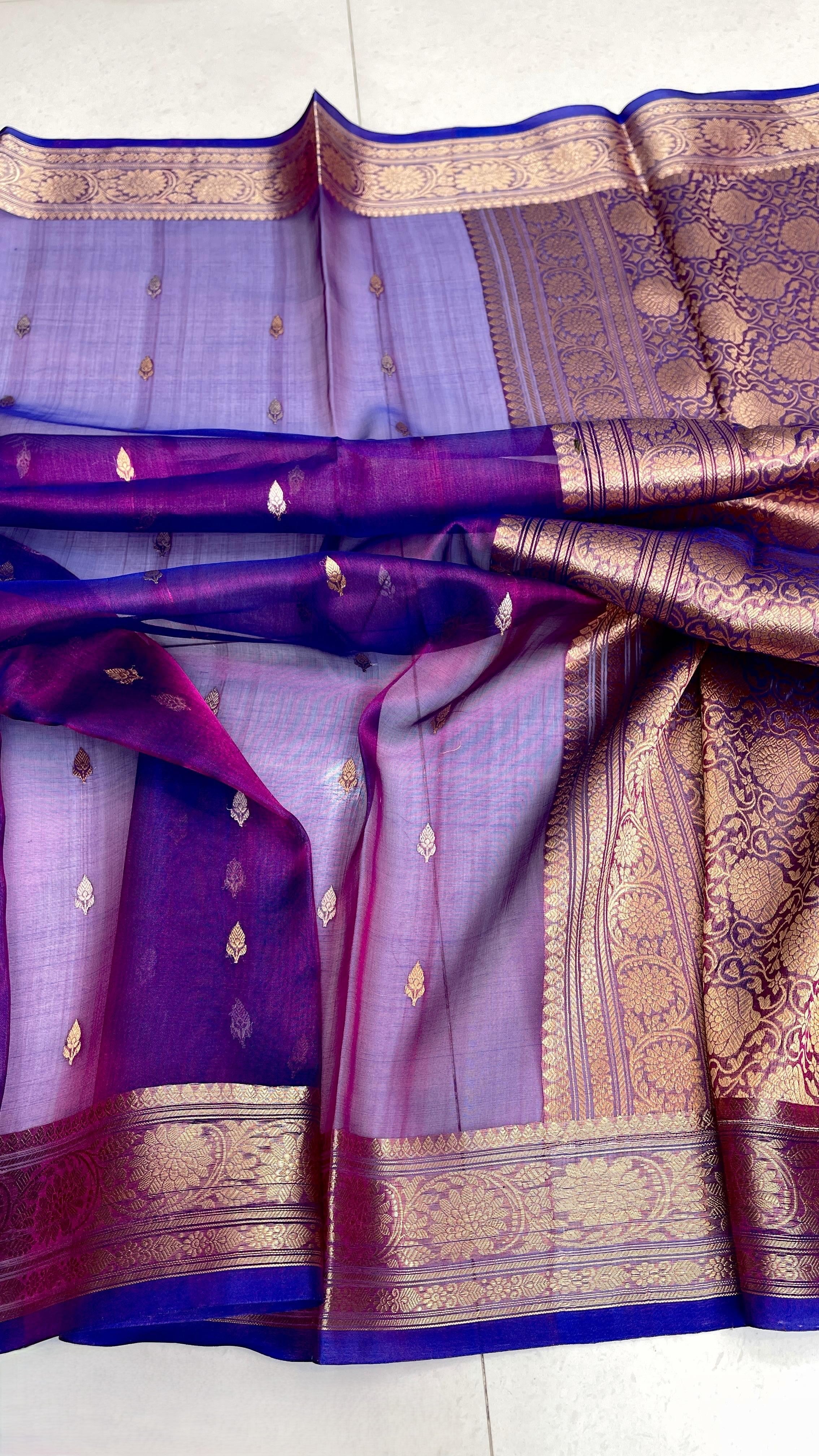 Dual Tone Blue Banarasi Handloom Kora Tissue Silk Saree featuring all-over gold and silver zari buttas, intricate gold zari borders, and a matching rich pallu.